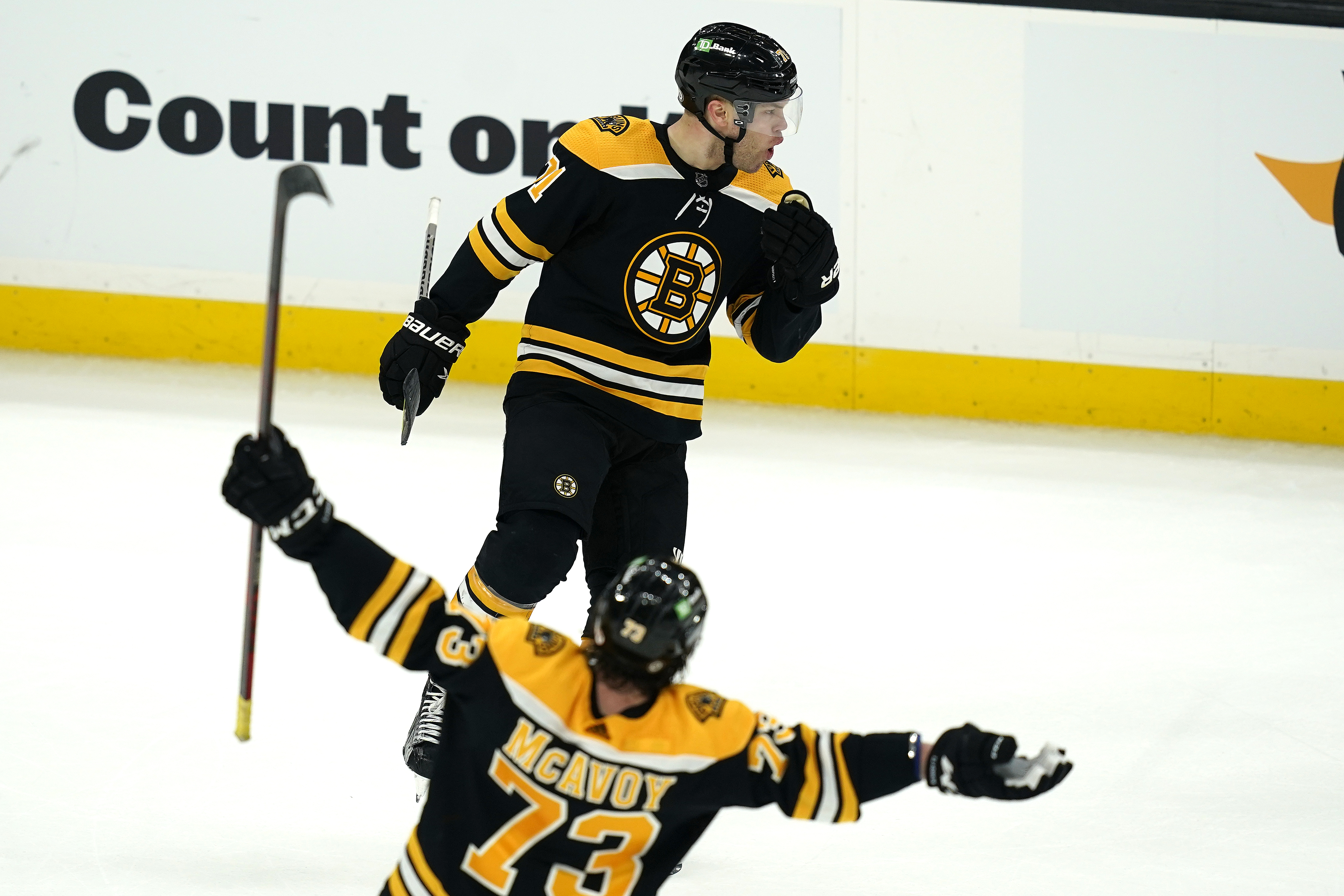 Charlie McAvoy of the Boston Bruins skates against against the New