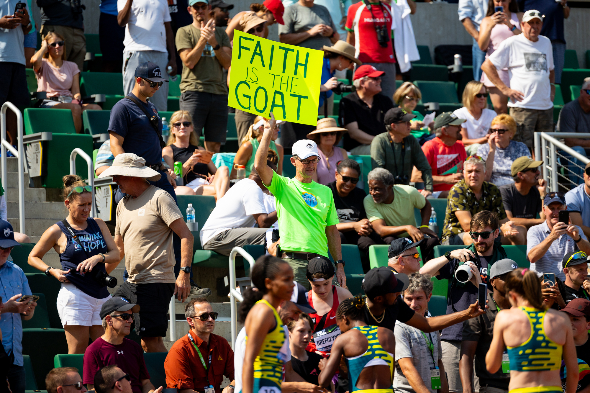 A fan holds a sign about Faith Kipyegon of Kenya during the Prefontaine Classic track and field meet on Saturday, Sept. 16, 2023, at Hayward Field in Eugene. Kipyegon won the women’s 1,500 meters.