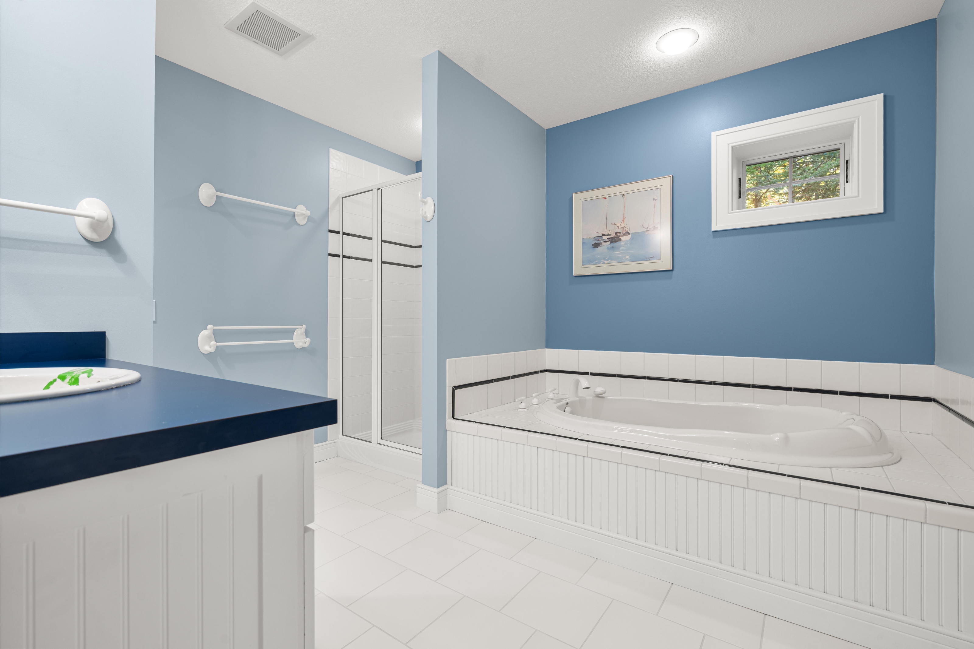 Interior photographs of 4093 Lake Shore Drive in Charlevoix, this gem is listed at $2,099,900 through Berkshire Hathaway HomeServices Michigan Real Estate – Traverse City and The Crane Group with associate broker Johnny Crane and his brother, co-listing agent Matt Crane.