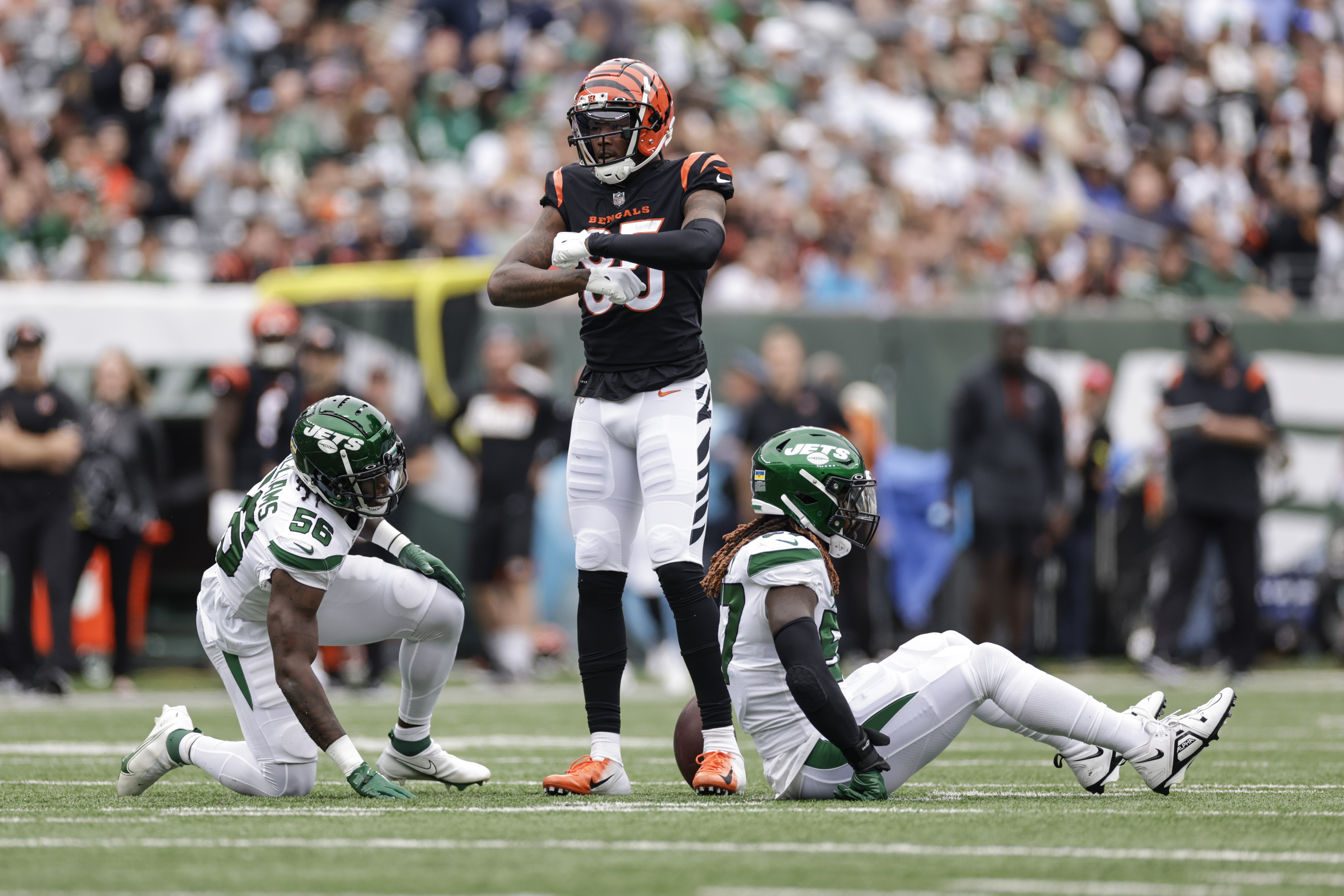 September 25, 2022, East Rutherford, New Jersey, USA: Cincinnati Bengals  linebacker Logan Wilson (55) makes an interception on a pass intended for  New York Jets wide receiver Braxton Berrios (10) during a