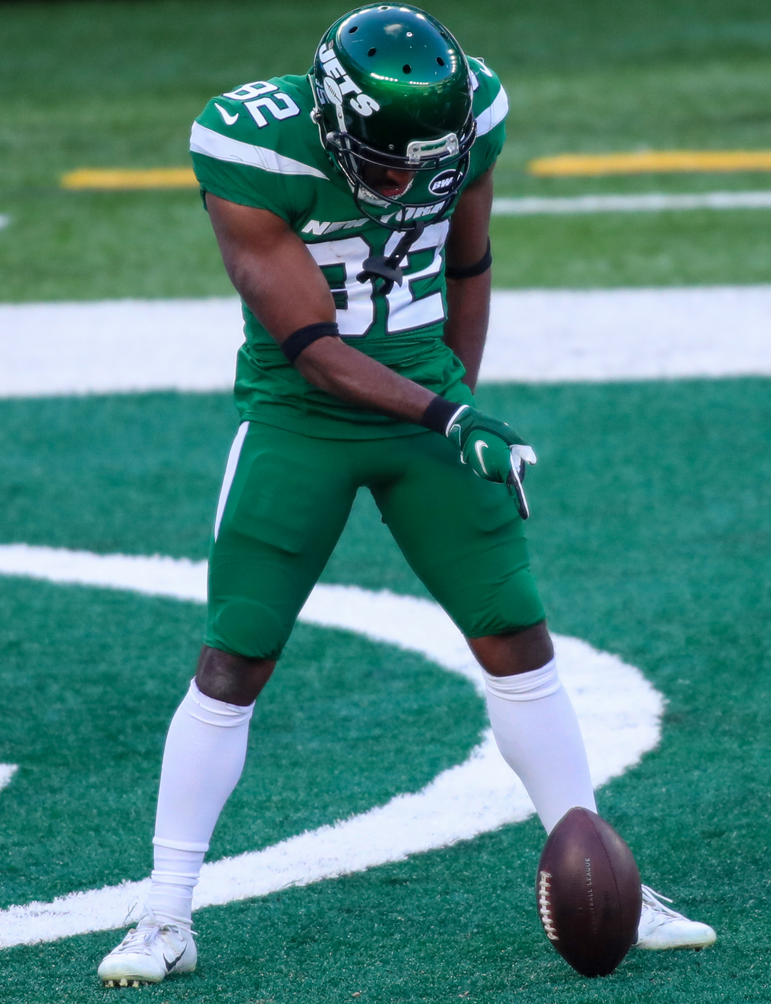 New York Jets cornerback Lamar Jackson (38) wears a shirt with a Crucial  Catch patch as he warms up on the field before taking on the Miami Dolphins  during an NFL football