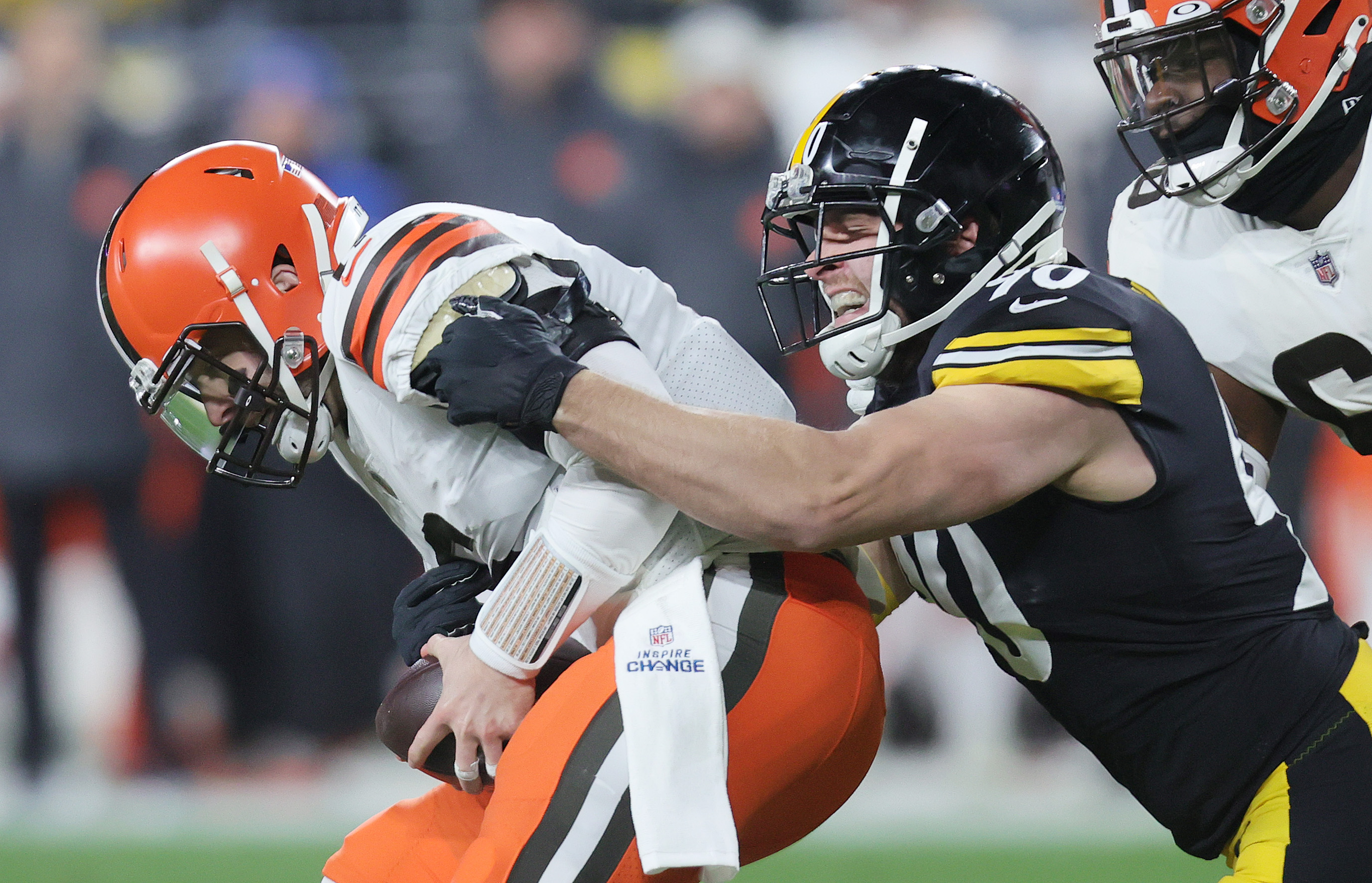 Pittsburgh Steelers outside linebacker T.J. Watt (90) sacks Cleveland Browns  quarterback Baker Mayfield (6) in the second half of an NFL football game,  Monday, Jan. 3, 2022, in Pittsburgh. (AP Photo/Don Wright