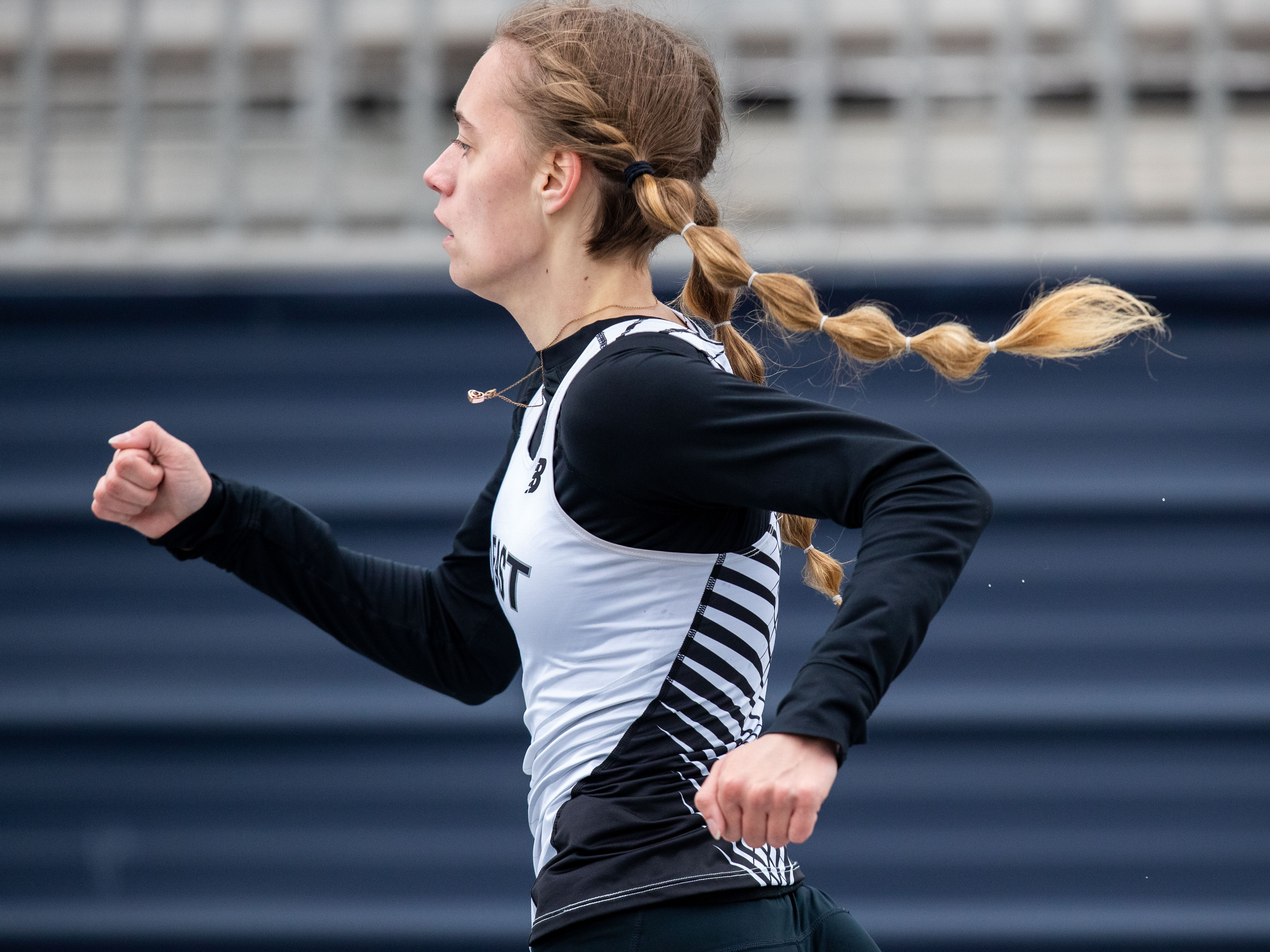 Central Dauphin East’s Madison Livingston finishes fourth in the 400 meter race at the 2023 Tim Cook Memorial Invitational track & field meet at Chambersburg, Pa., Mar. 25, 2023.Mark Pynes | pennlive.com