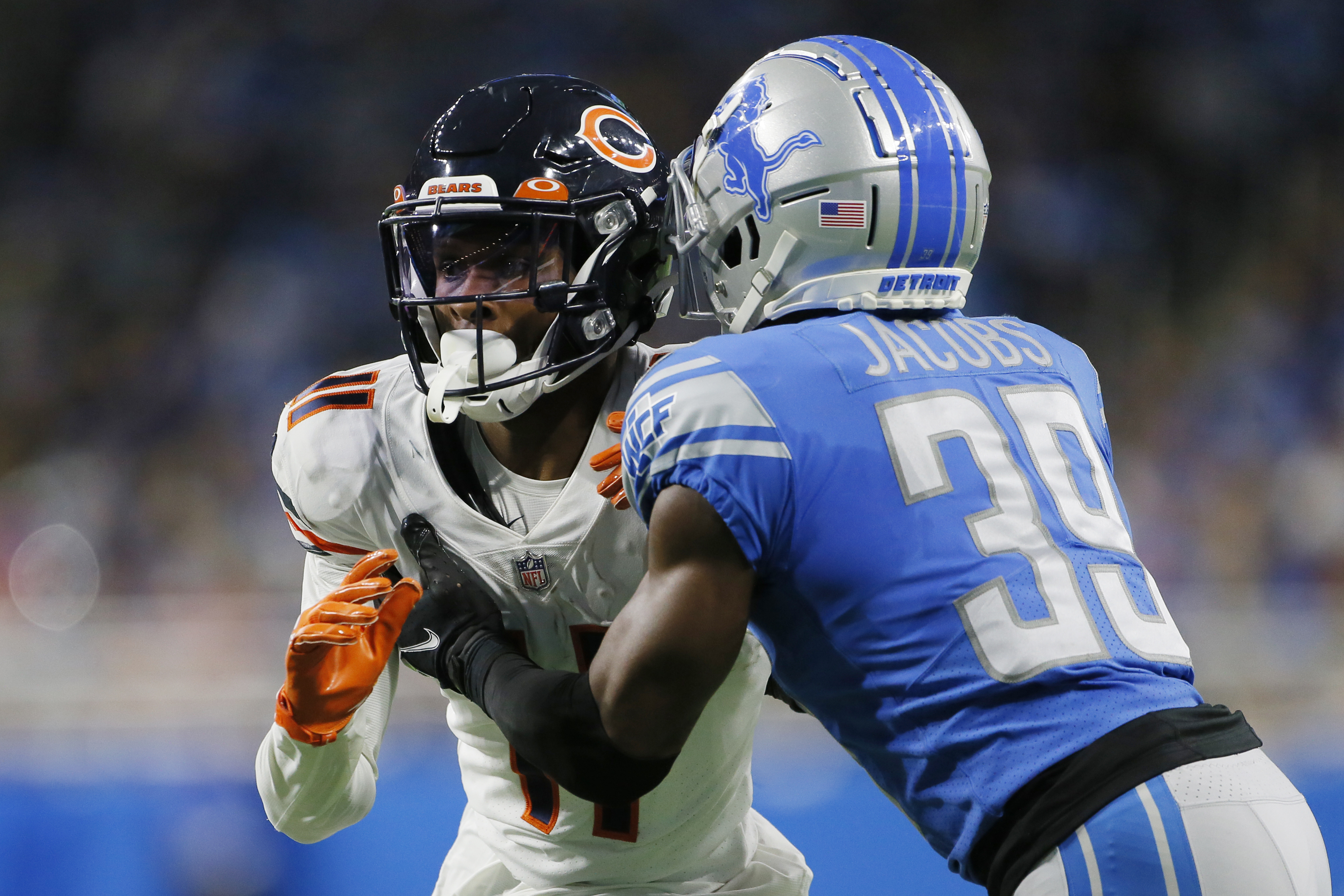 Chicago Bears wide receiver Darnell Mooney (11) is unable to catch a ball  as Detroit Lions cornerback Jerry Jacobs (39) defends in the second quarter  at Ford Field in Detroit on Thursday