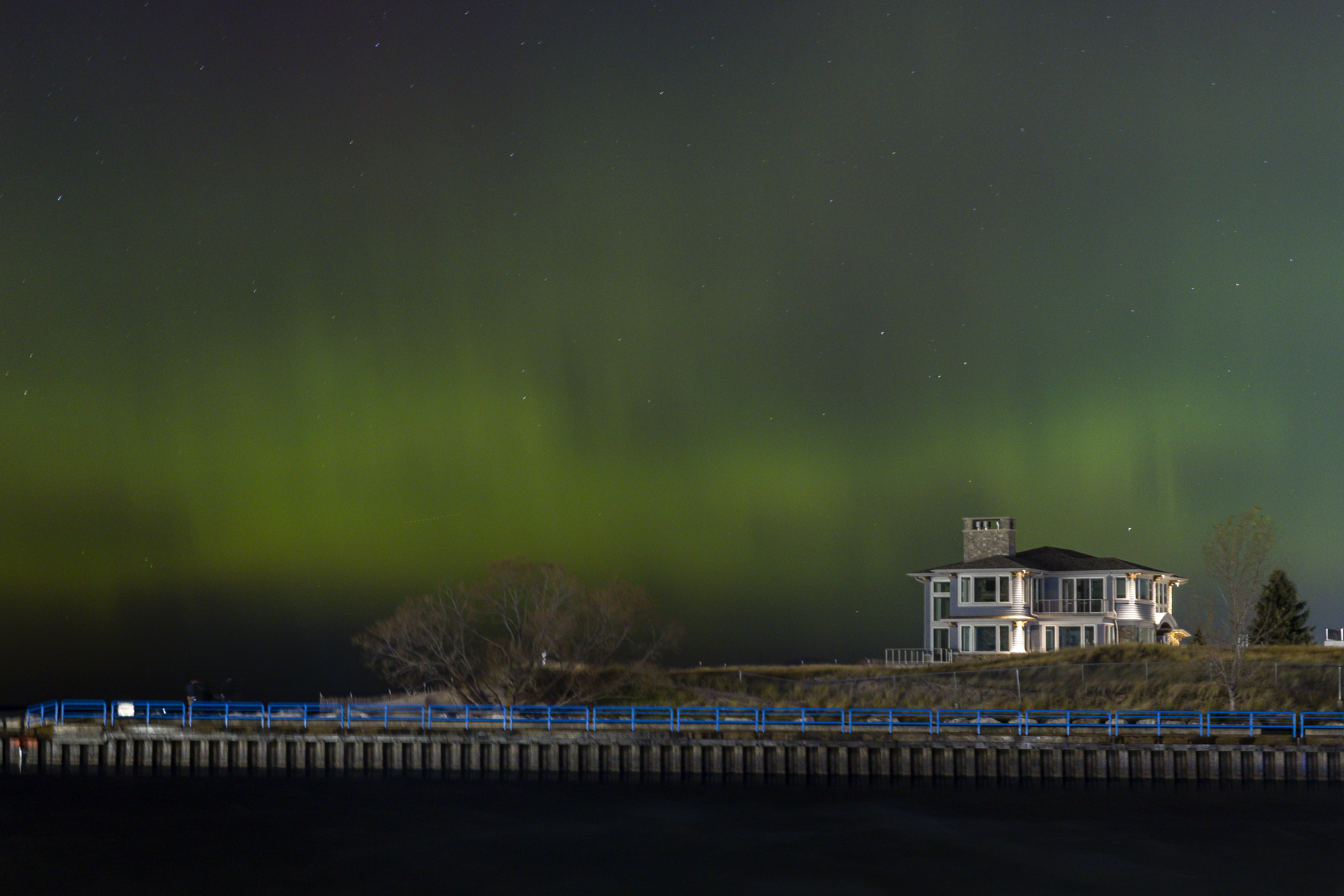 Northern lights dance above iconic Lake Michigan beach - mlive.com