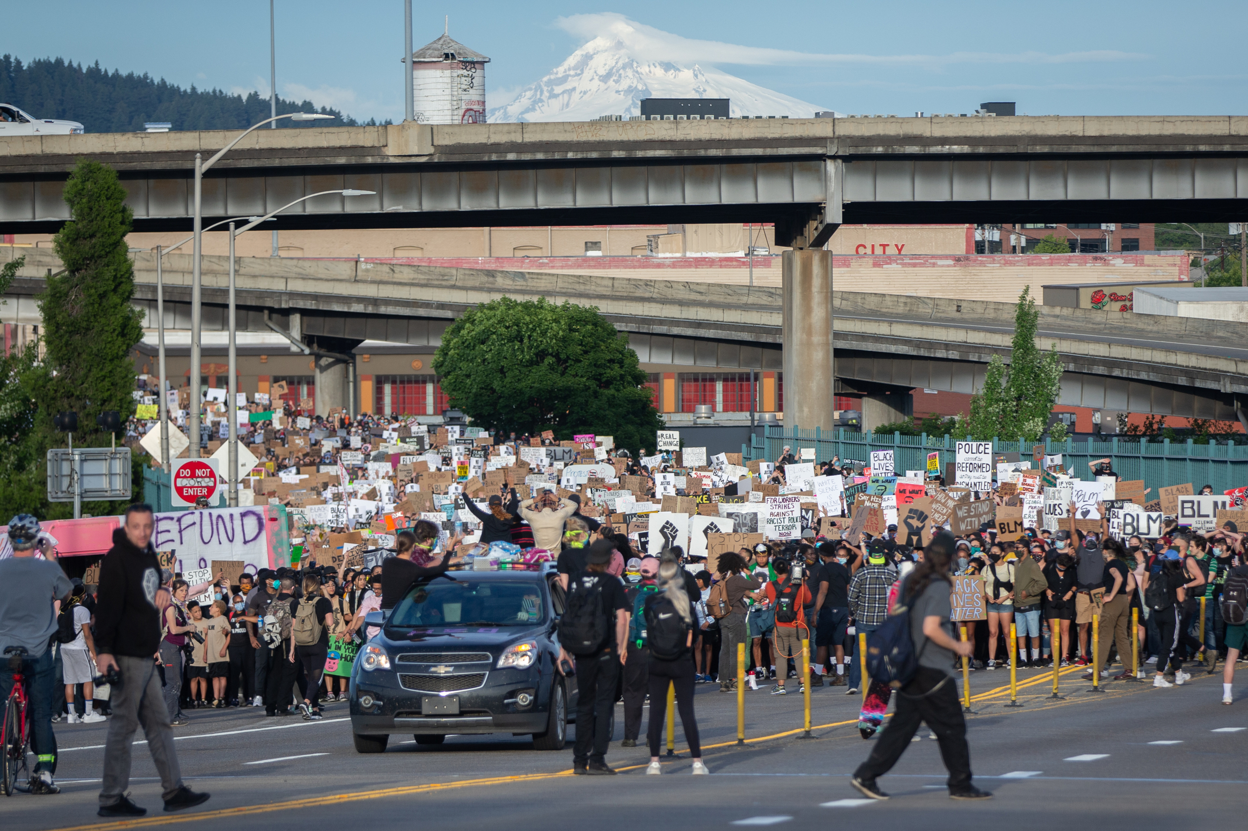 Protesters took to the streets of Portland, Ore., for the eighth consecutive day of demonstrations demanding equal rights and protesting against racial injustice and police brutality in the wake of the death of George Floyd, a black man killed by police in Minneapolis. Mark Graves/Staff Mark Graves