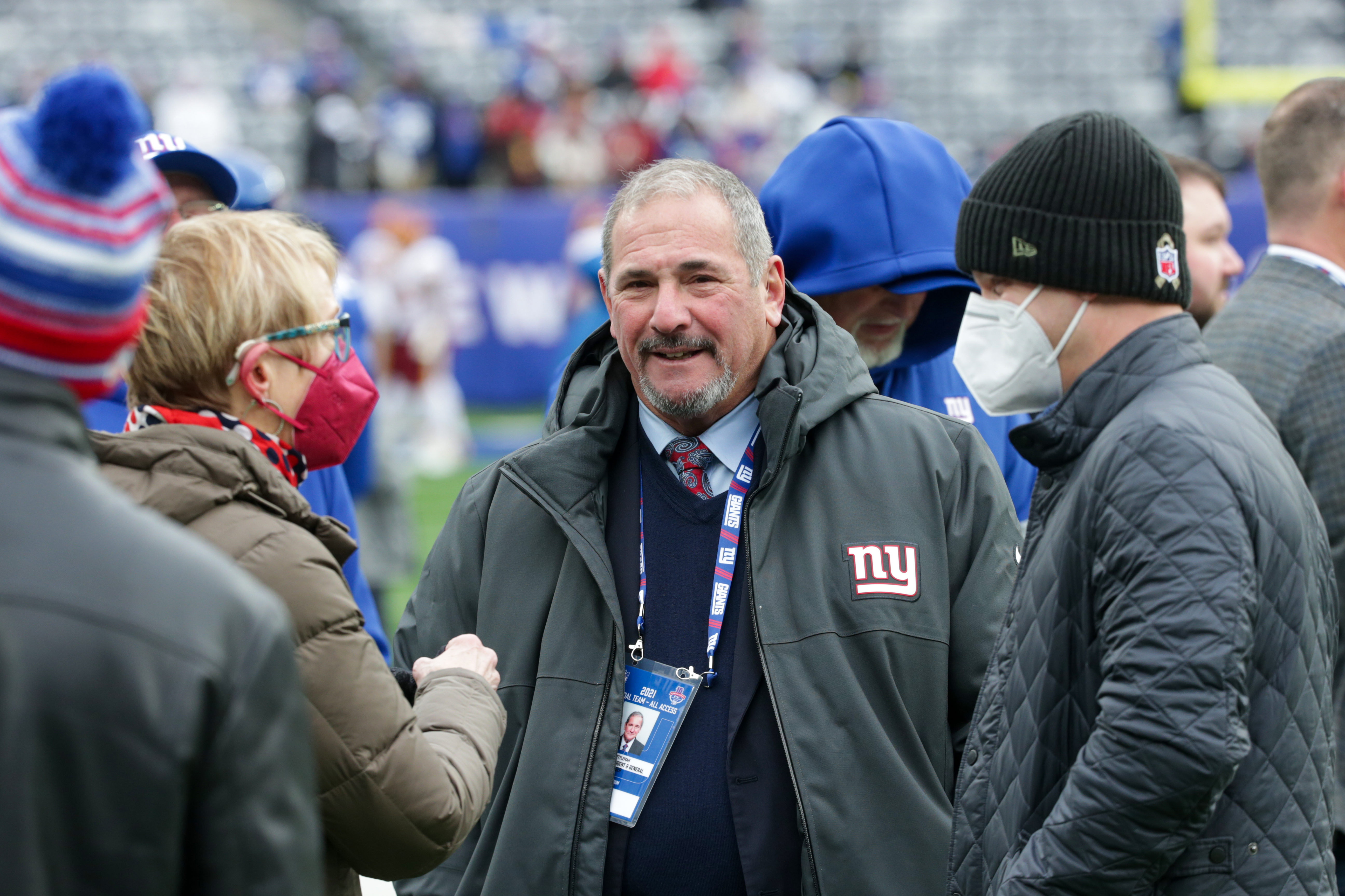New York Giants general manager Dave Gettleman (center) with his family during pregame warmups as the Giants prepare to host the Washington Football Team on Sunday, Jan. 9, 2022 in East Rutherford, N.J.