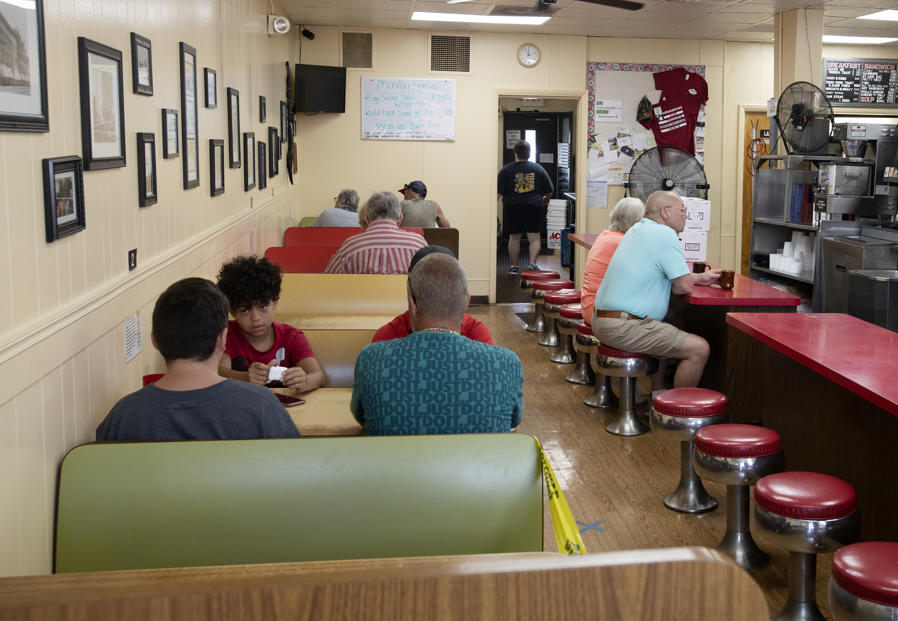 Customers sit at Virginia Coney Island, 649 E. Michigan Ave., on Monday, July 6, 2020. The restaurant has been serving the Jackson community since 1914.