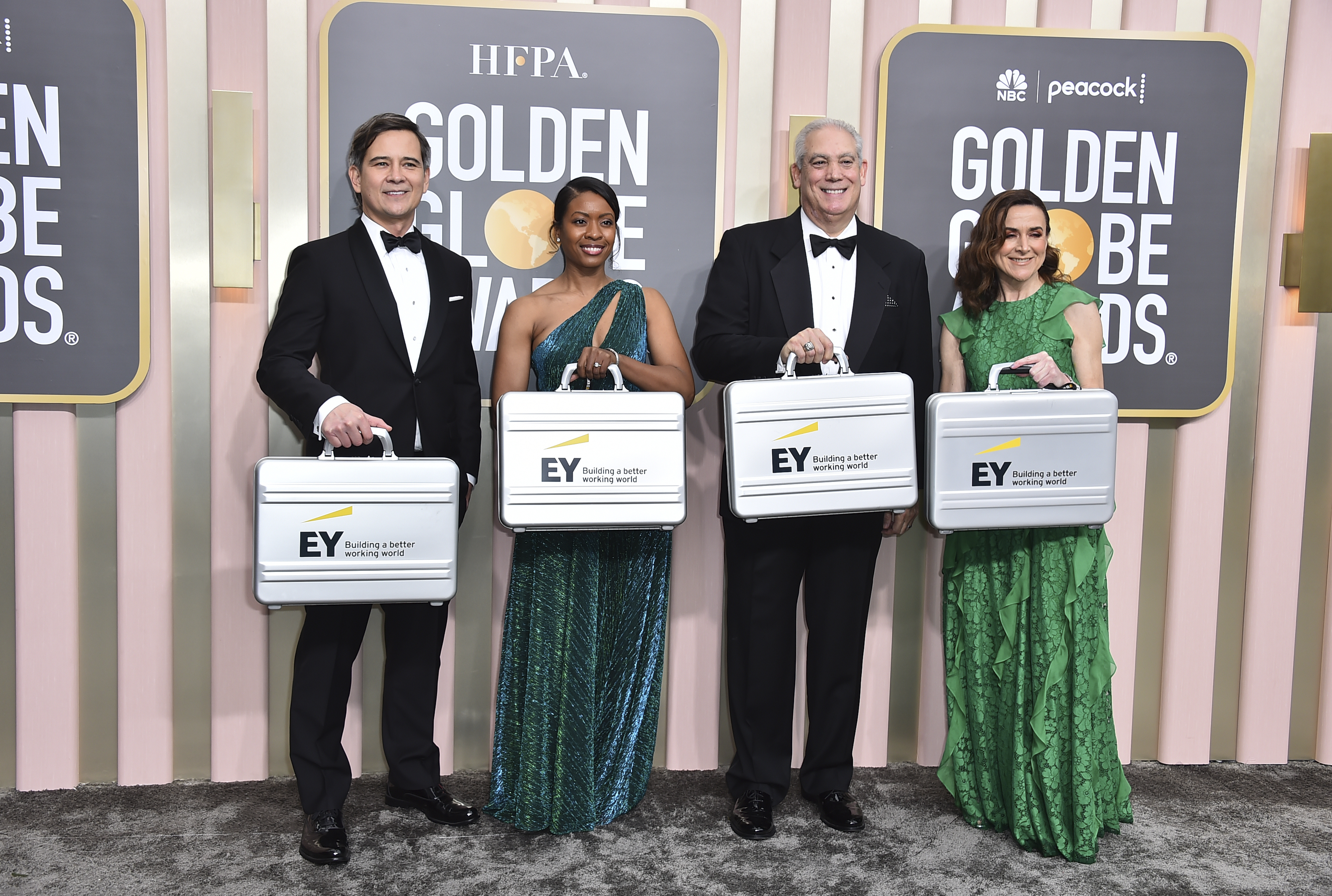 EY representatives arrive at the 80th annual Golden Globe Awards at the Beverly Hilton Hotel on Tuesday, Jan. 10, 2023, in Beverly Hills, Calif. (Photo by Jordan Strauss/Invision/AP)