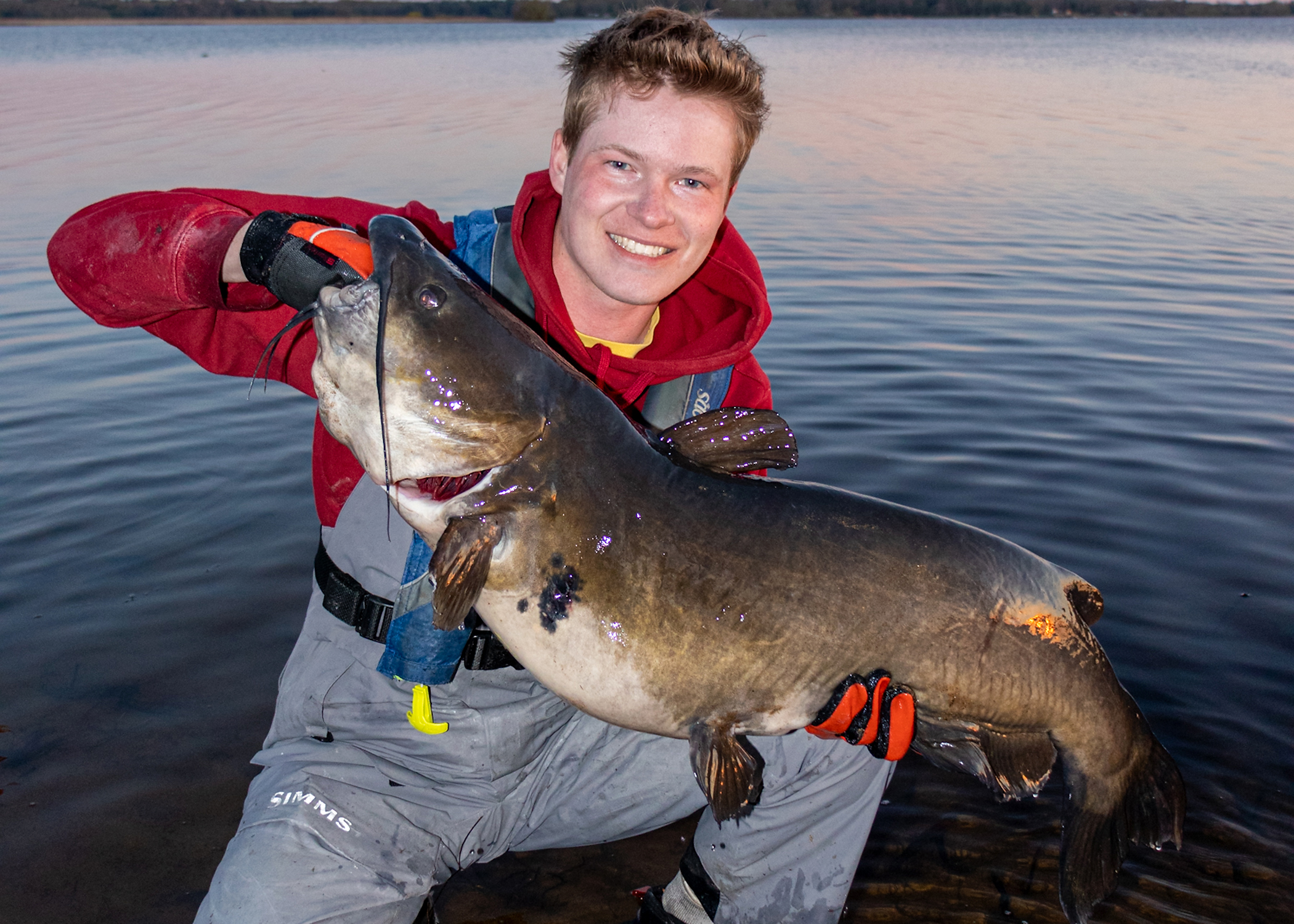 Watertown man catches record-breaking 35 lb. catfish from his kayak 