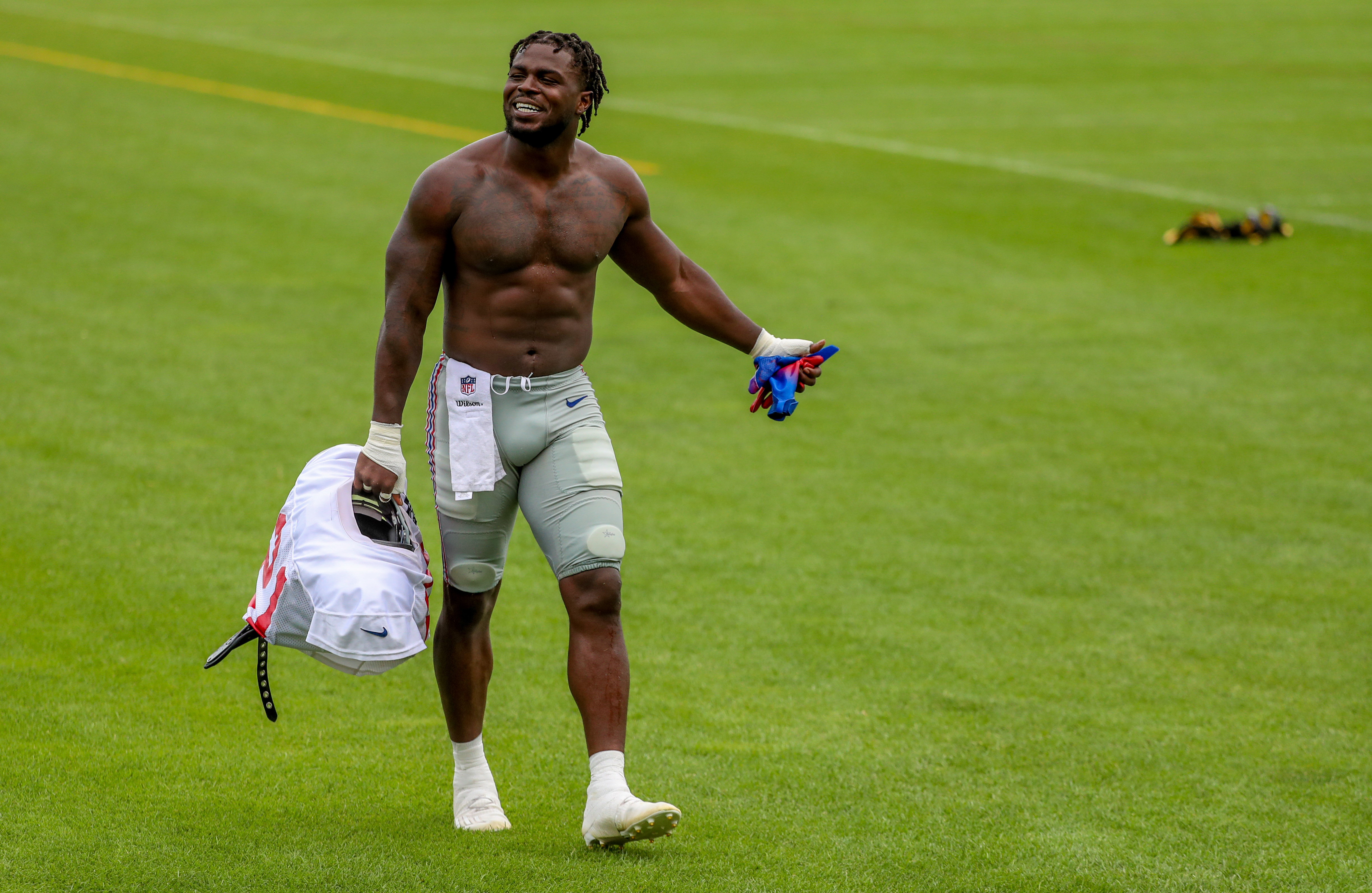 New York Giants wide receiver Sterling Shepard (3) and New York Giants  inside linebacker Blake Martinez (54) walk to the locker room before the  start of an NFL football game against the