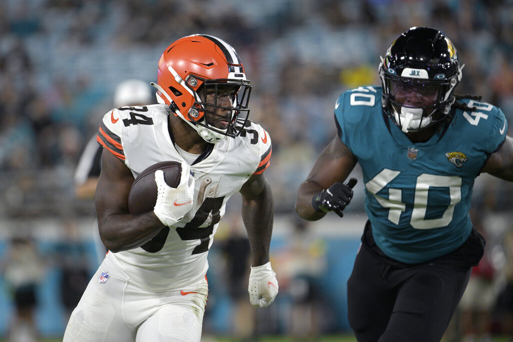 Cleveland Browns running back Jerome Ford (34) warms up prior to the start  of an NFL preseason football game against the Philadelphia Eagles, Sunday,  Aug. 21, 2022, in Cleveland. (AP Photo/Kirk Irwin