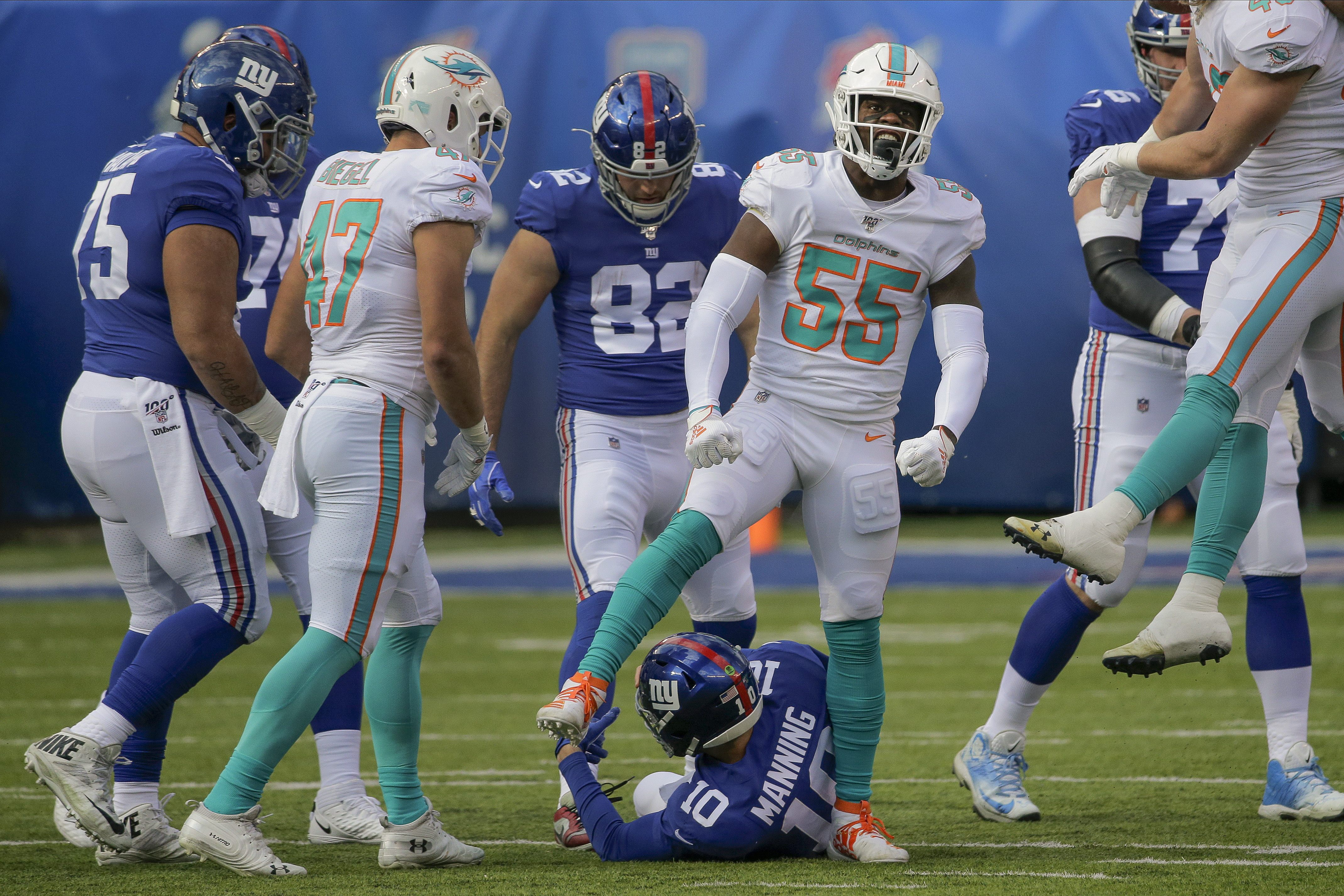 Miami Dolphins outside linebacker Jerome Baker (55) against the