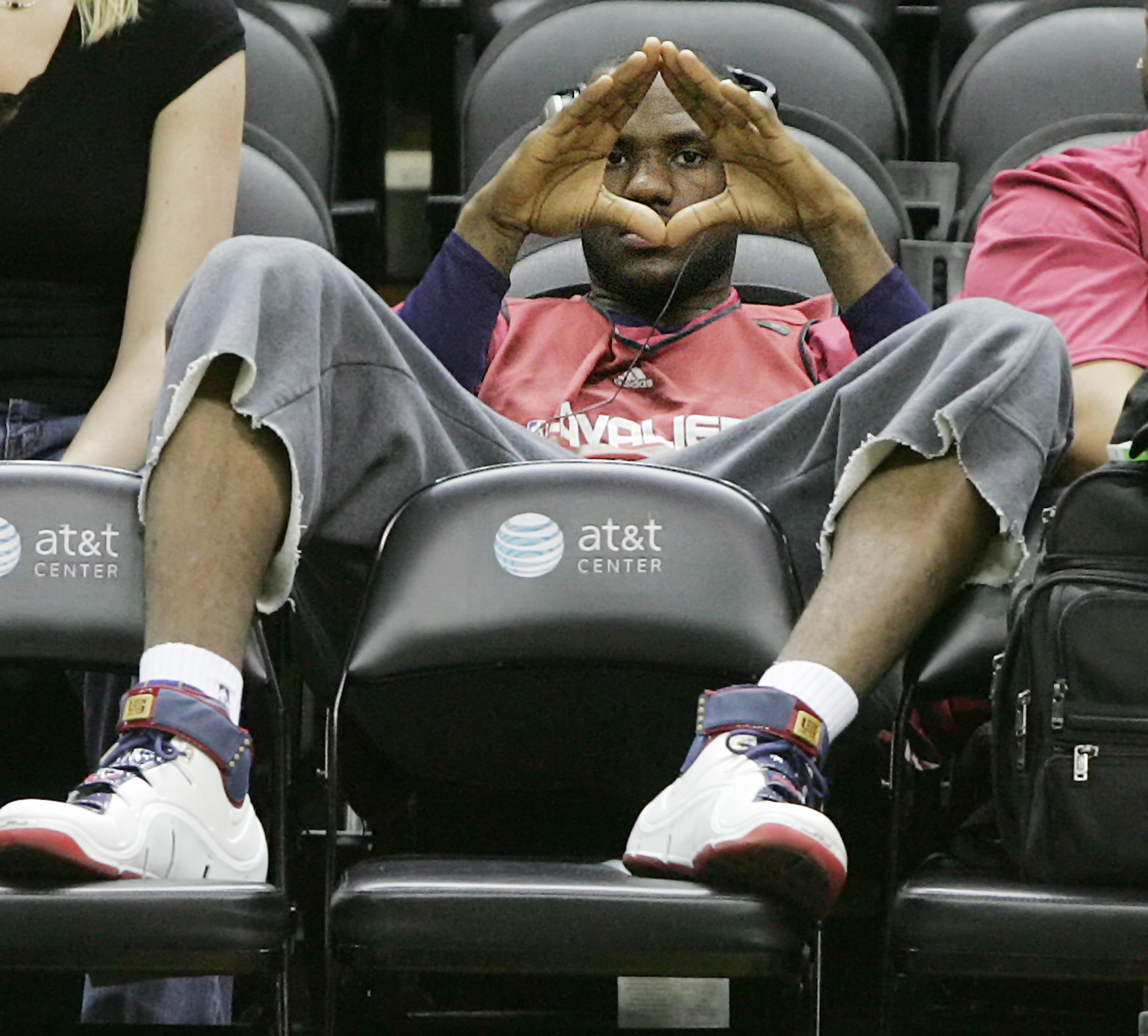Cleveland Cavaliers LeBron James looks at the press across court through his hands before a practice session June 8, 2007 at the AT T Center in San Antonio, Texas in preparation for game 2 of the NBA Finals against the San Antonio Spurs.  (John Kuntz/The Plain Dealer) 