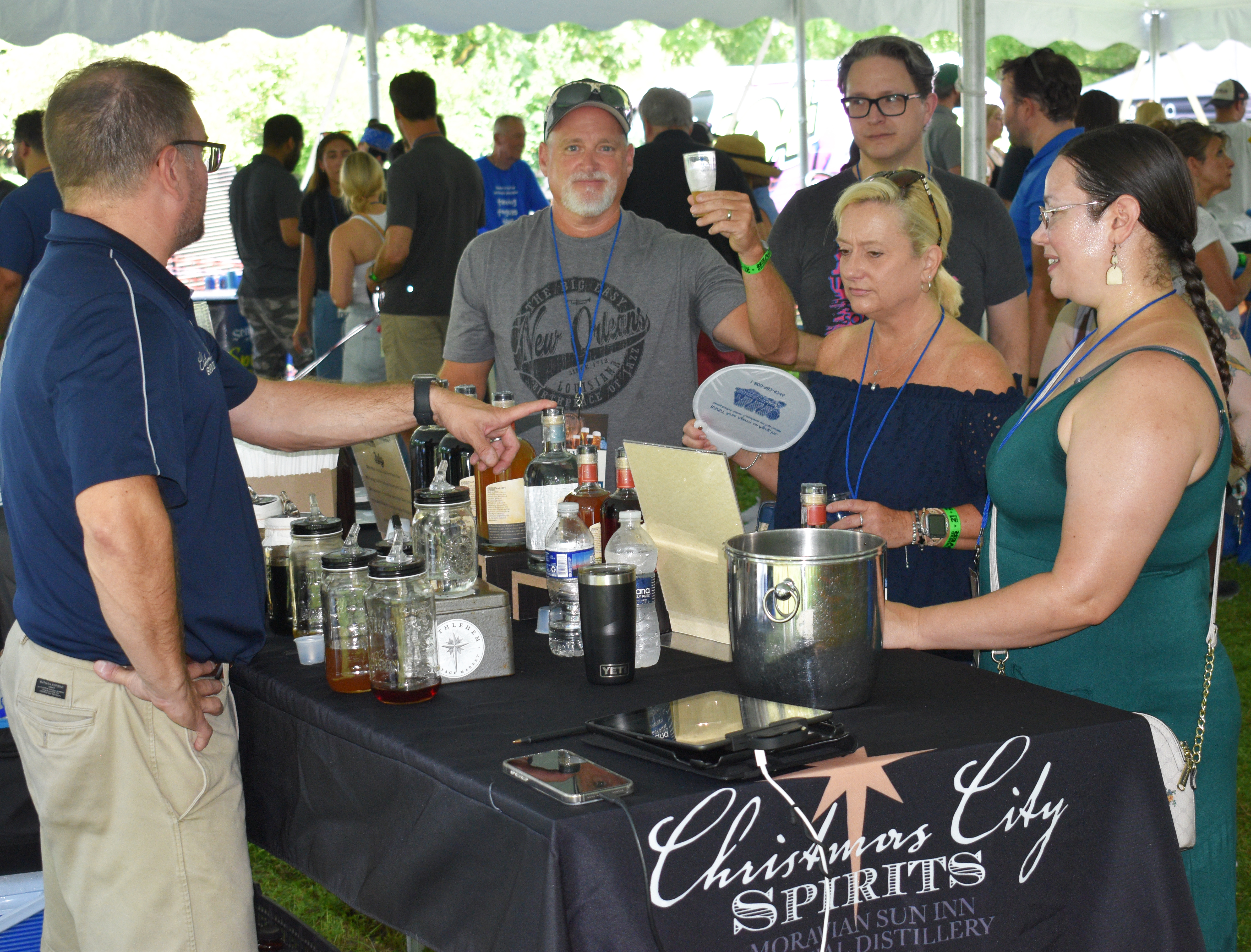 Christmas City Spirits offers pours in the Blueberry Tavern as Historic Bethlehem Museums & Sites hosts the first of two days of its Blueberry Festival & Market To Go on Saturday, July 13, 2024, at Burnside Plantation.