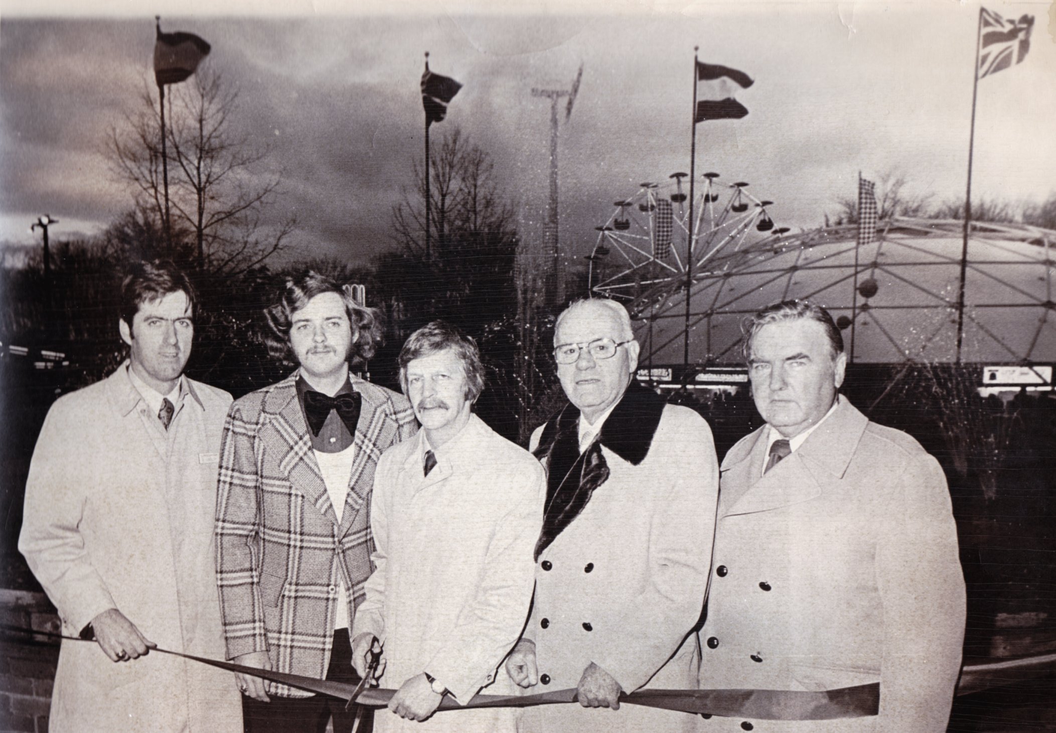 April 8, 1974- Agawam - The new International Plaza is opened at Riverside Park. Participated in the ribbon-cutting ceremonies are, left to right, Edward J. Carroll Jr., assistant general manager at Riverside, Agawm Town Councillor Joseph DellaGuistina, James D. Westman, town manager, Edward J. Carroll, owner of Riverside and Edmund Coffey, Agawam town councilor.