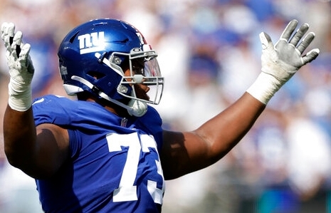 Giants' Evan Neal leaning on All-Pro LT Andrew Thomas, hoping for similar  Year 2 leap