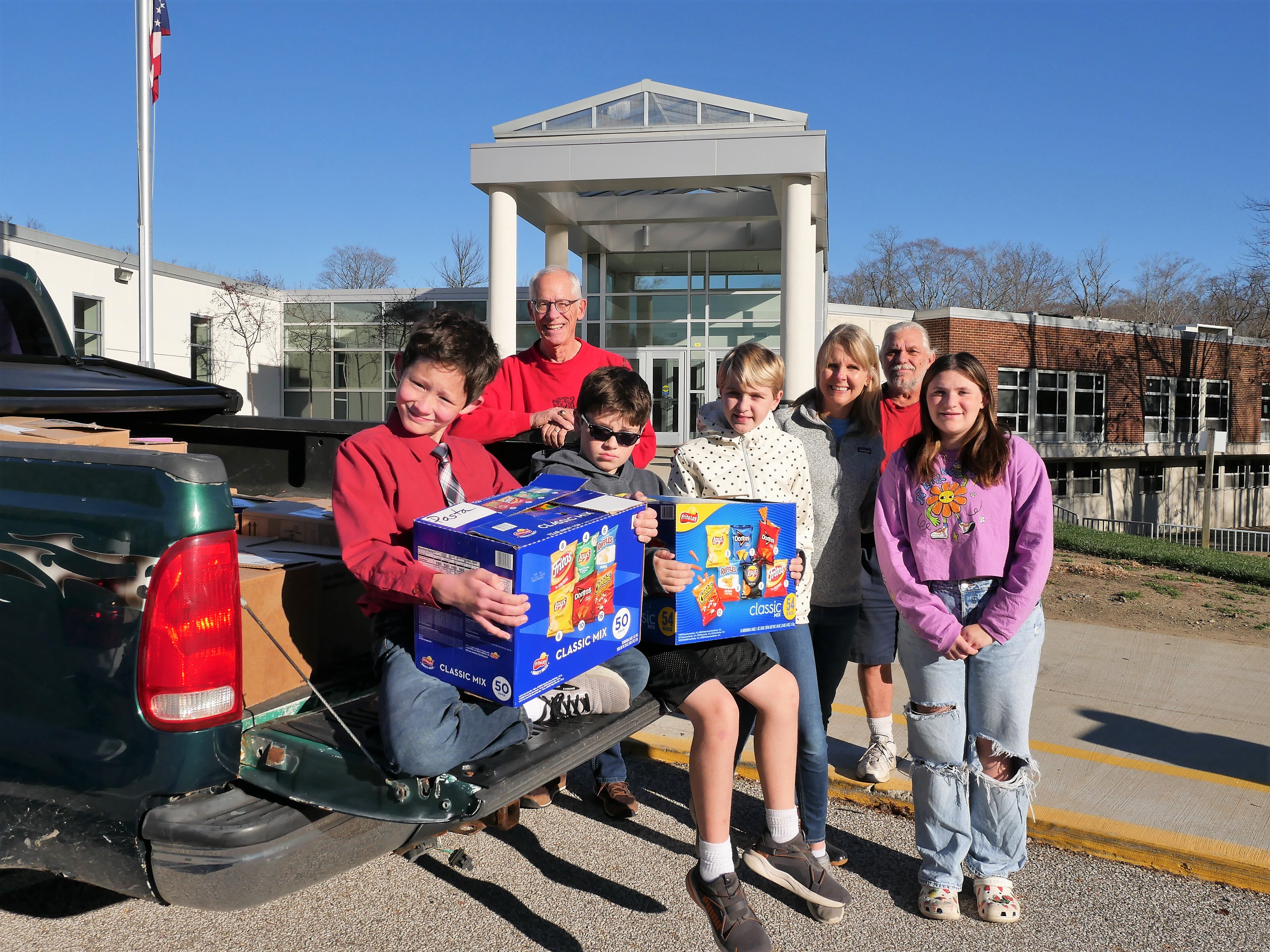 Brady Middle School club donates nearly 1,000 items for holiday food drive  