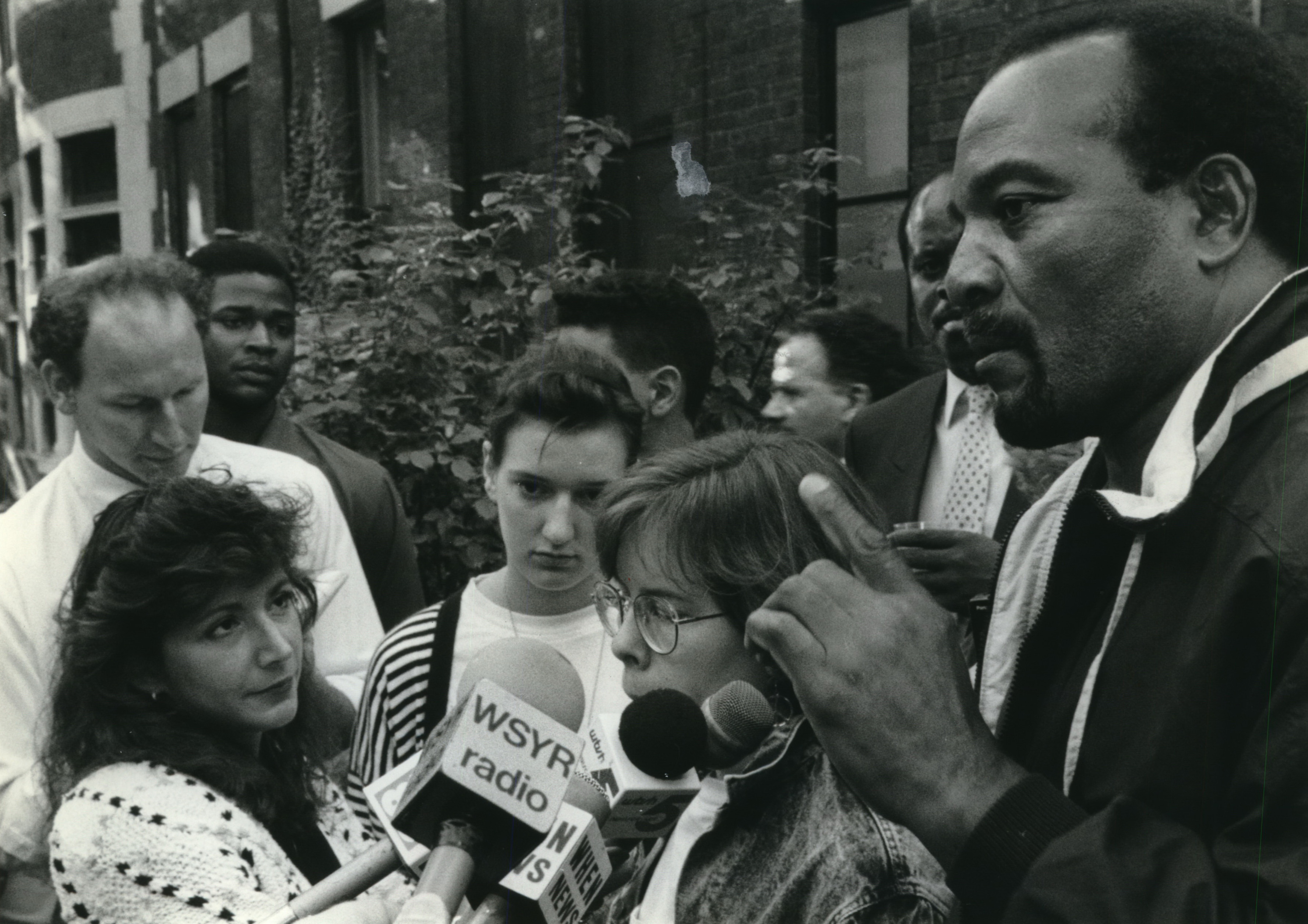 Jim Brown holds a press conference on the subject of women and rape near Chancellor Melvin Eggers house in 1989.