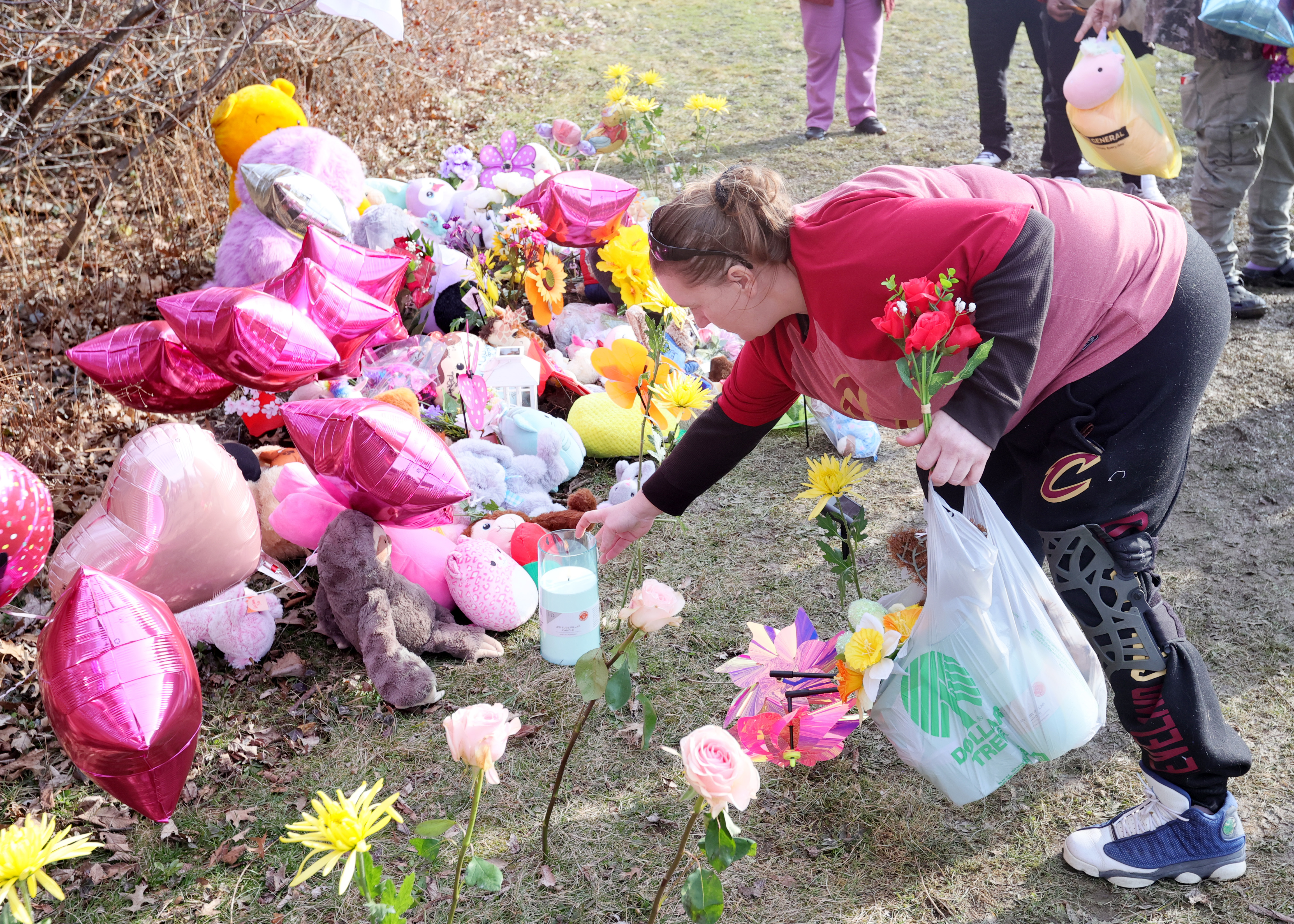 Vigil for sisters Amor Wilson and Mila Chatman at the site where they were  discoverd in a field next to Ginn Academy - cleveland.com