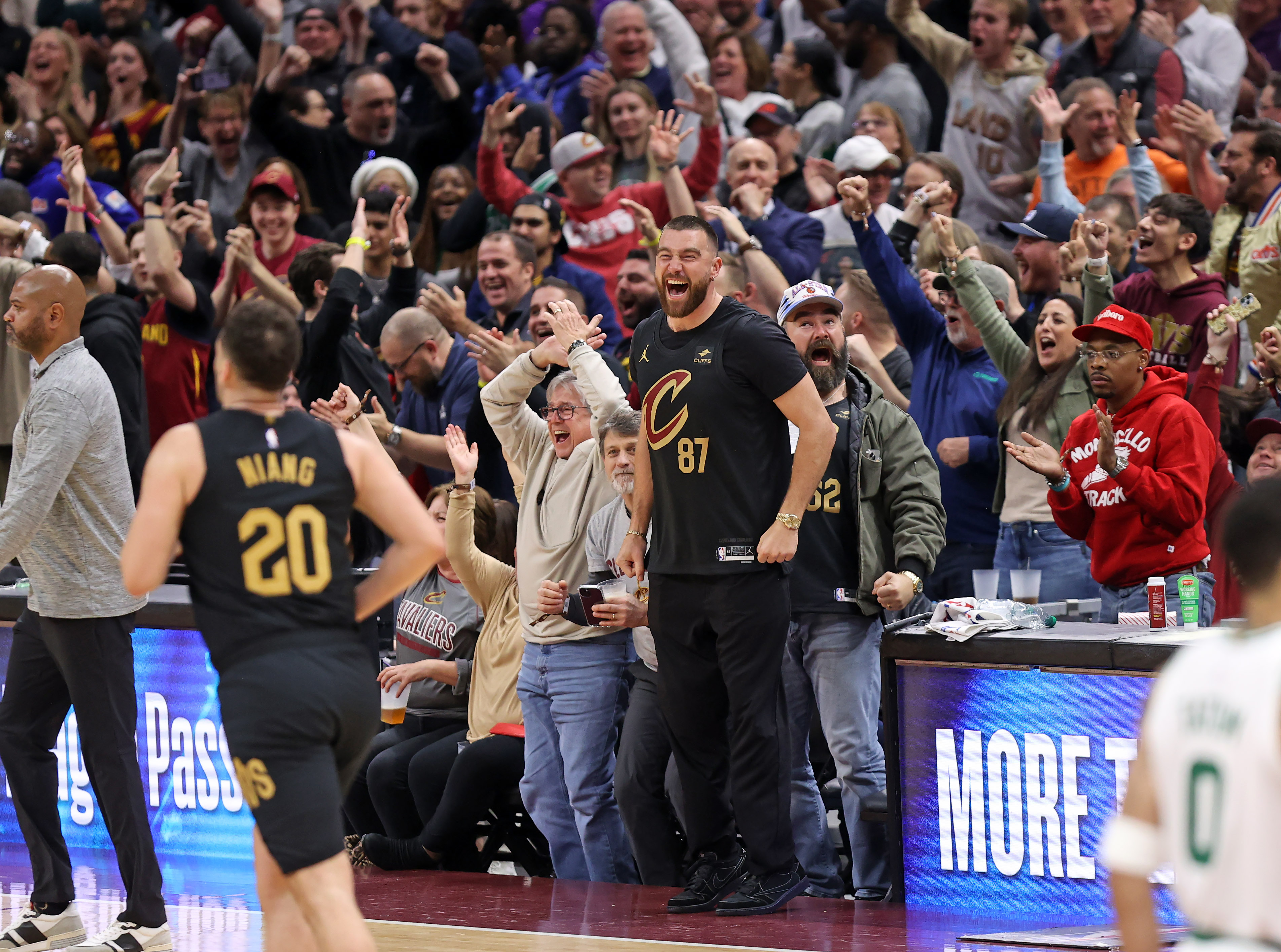 Travis and Jason Kelce react after a Dean Wade three pointer against the Boston Celtics in the second half of play. 