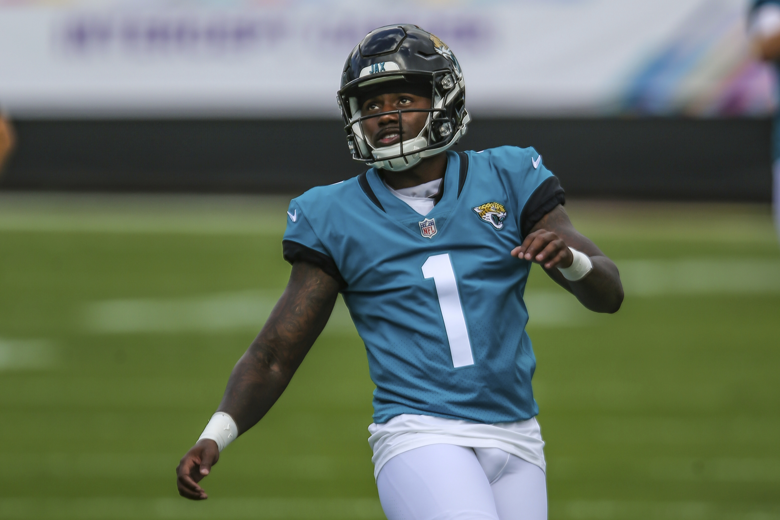 Jacksonville Jaguars linebacker K'Lavon Chaisson (45) warms up