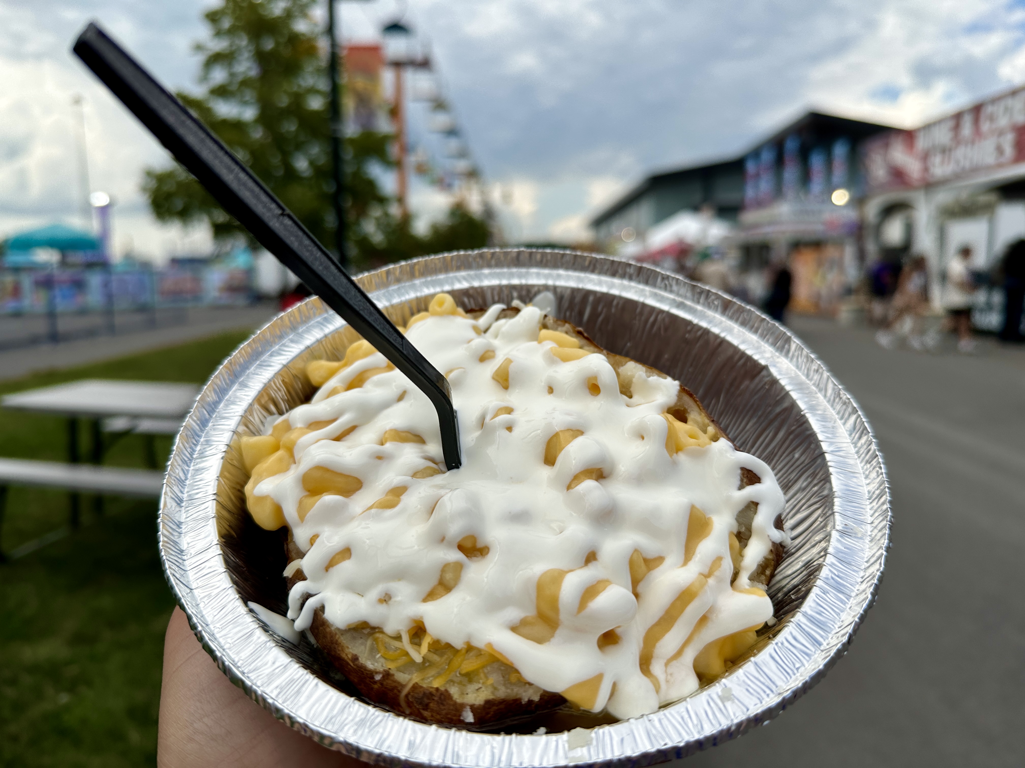 Oven Fresh Baked Potatoes at the 2023 NYS Fair. Mac Baked potato with butter and macaroni and cheese and sour cream. Sunny Hernandez | ahernandez@nyup.com