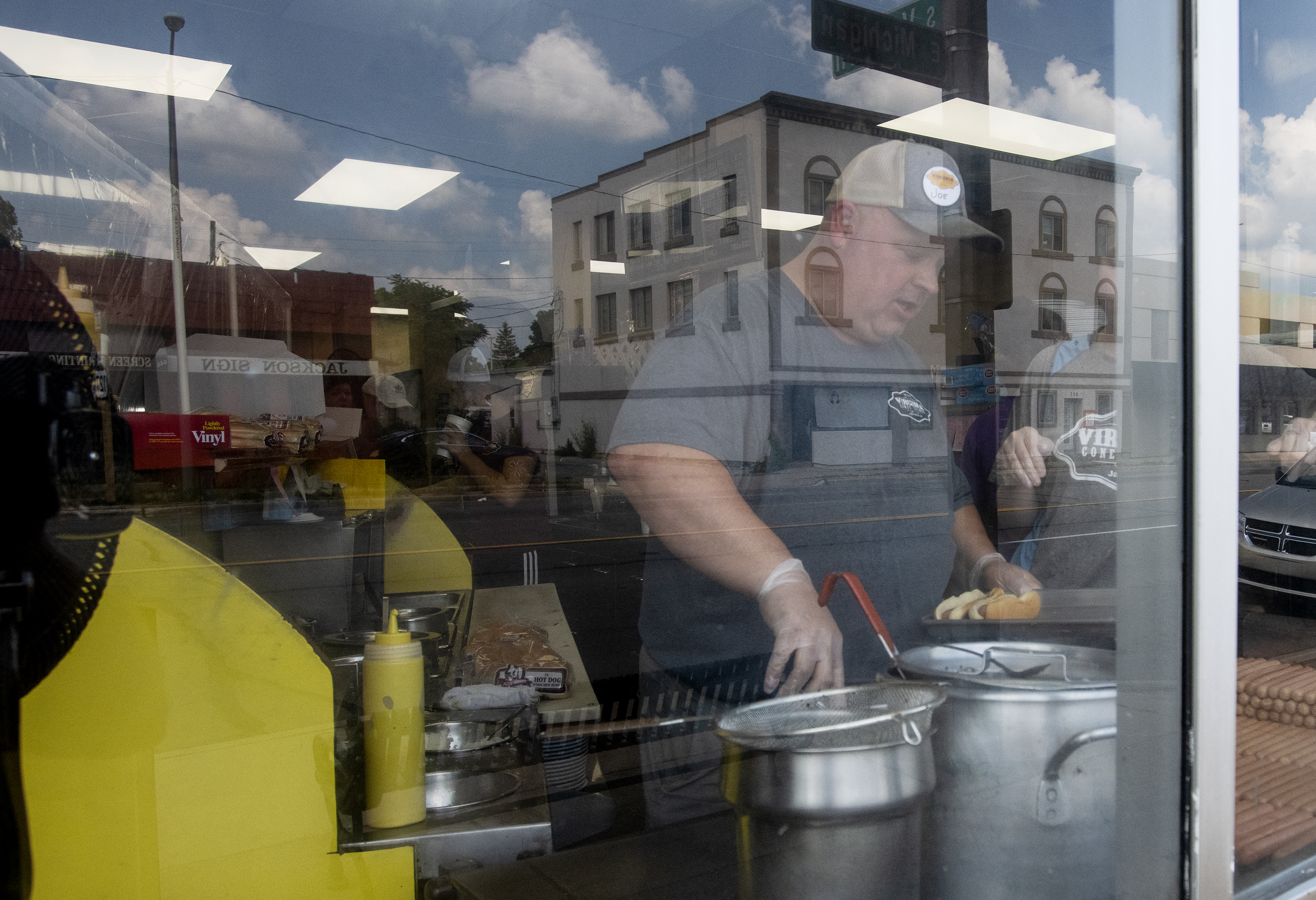 Co-owner Joe Matthews works in the kitchen at Virginia Coney Island, 649 E. Michigan Ave., on Monday, July 6, 2020. The restaurant has been serving the Jackson community since 1914.