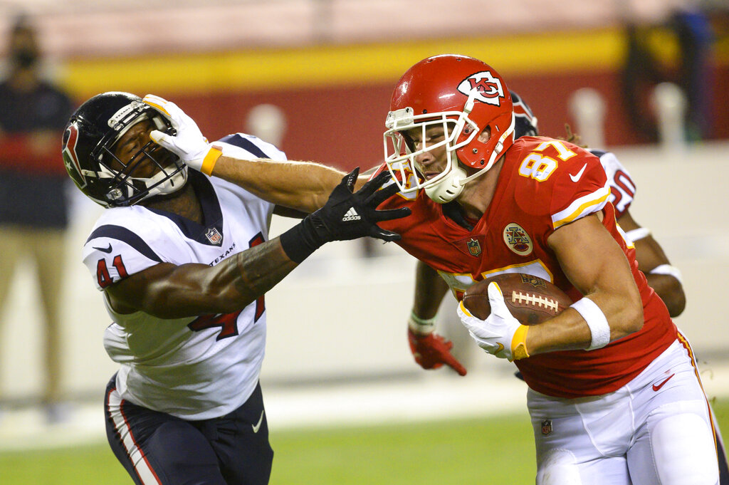 Chiefs begin title defense with 34-20 victory over Texans