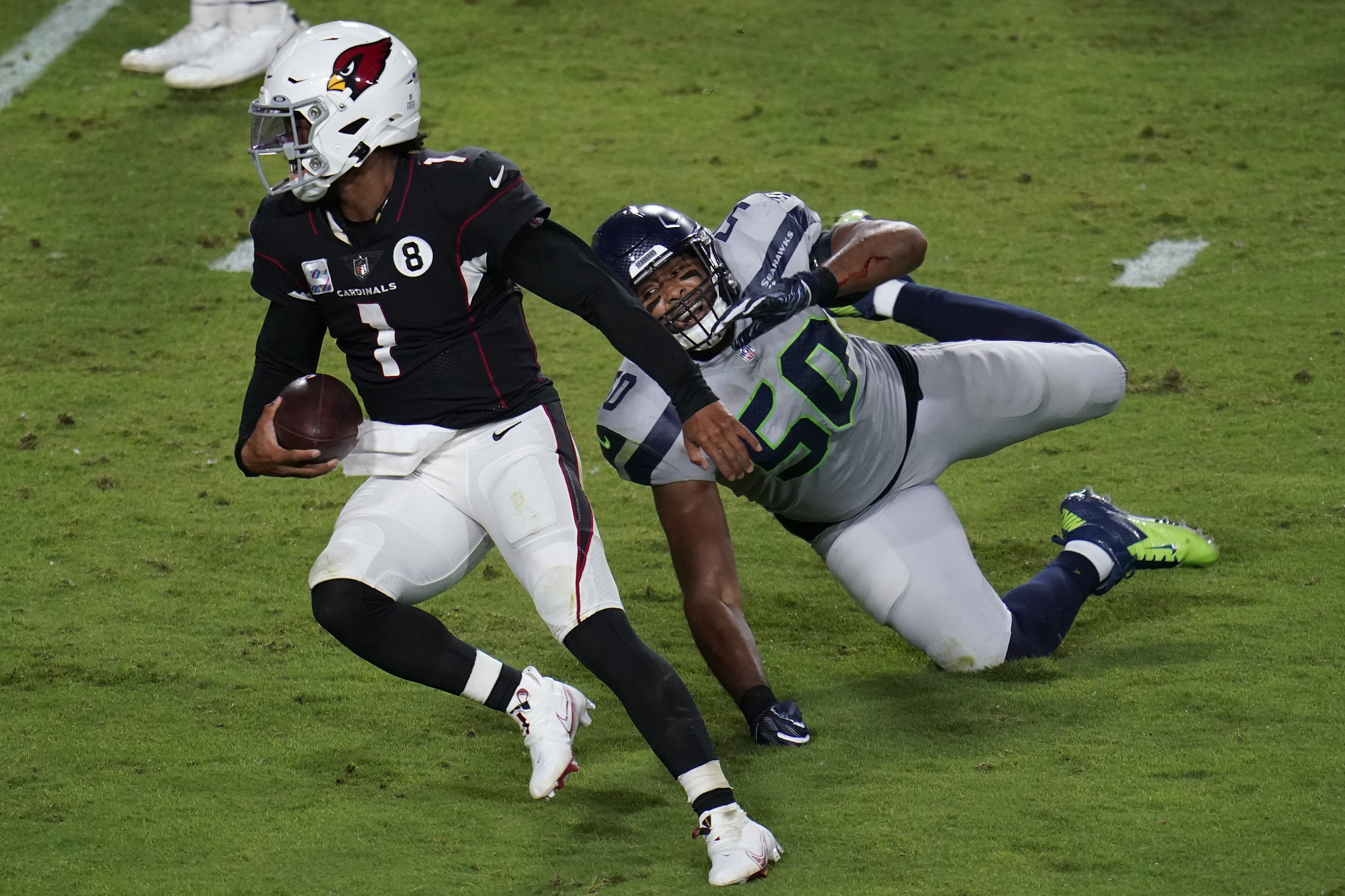 Seahawks rally for 21-20 win over Cardinals, but still miss out on