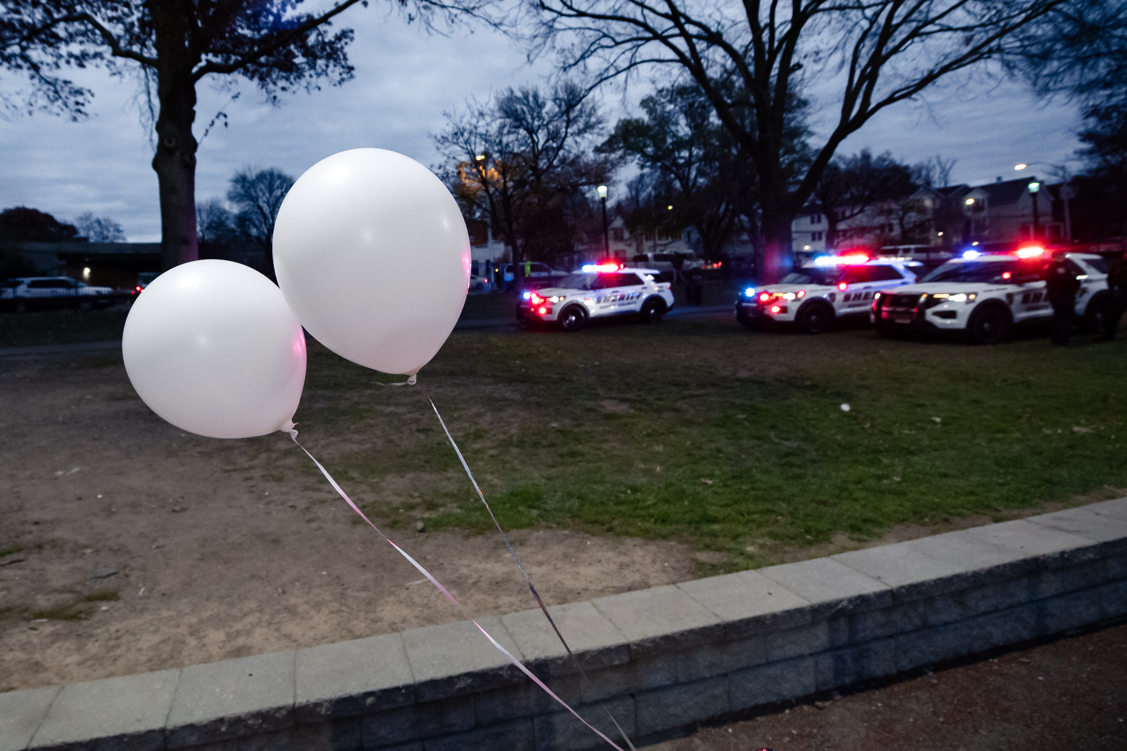 Community honors Newark shooting victims with a balloon release ...