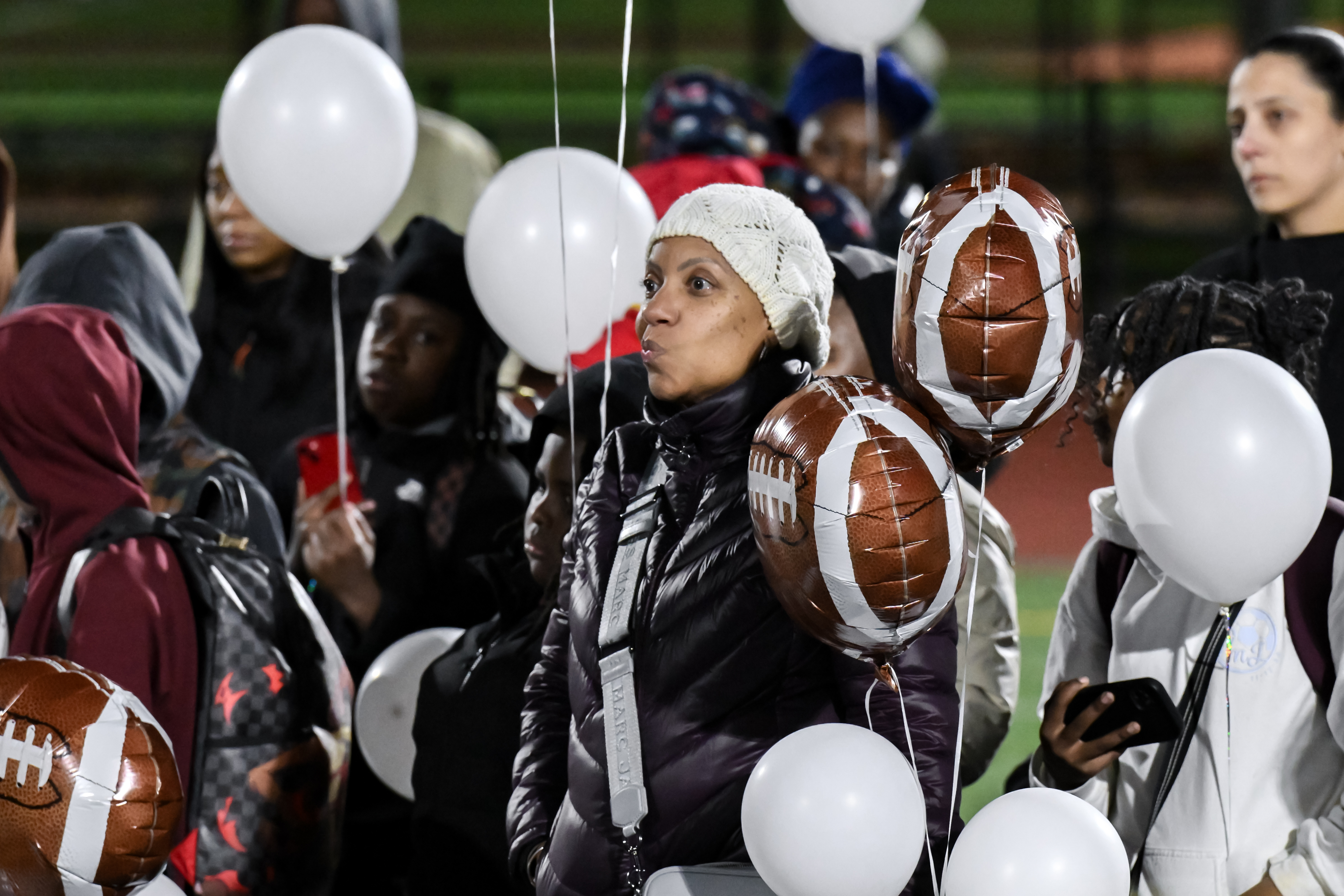 Community honors Newark shooting victims with a balloon release ...