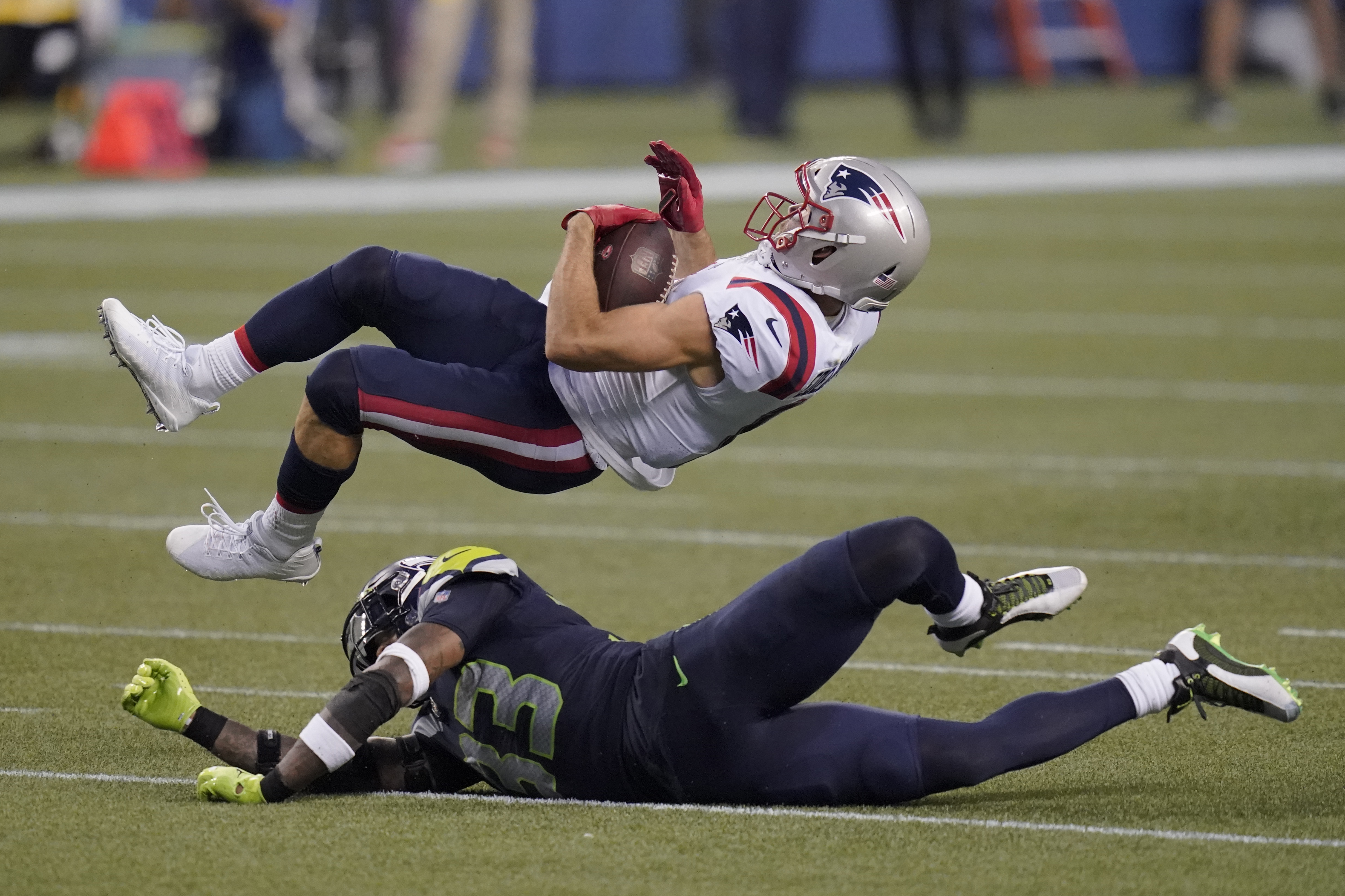 New England Patriots running back Jakob Johnson (47) runs off the