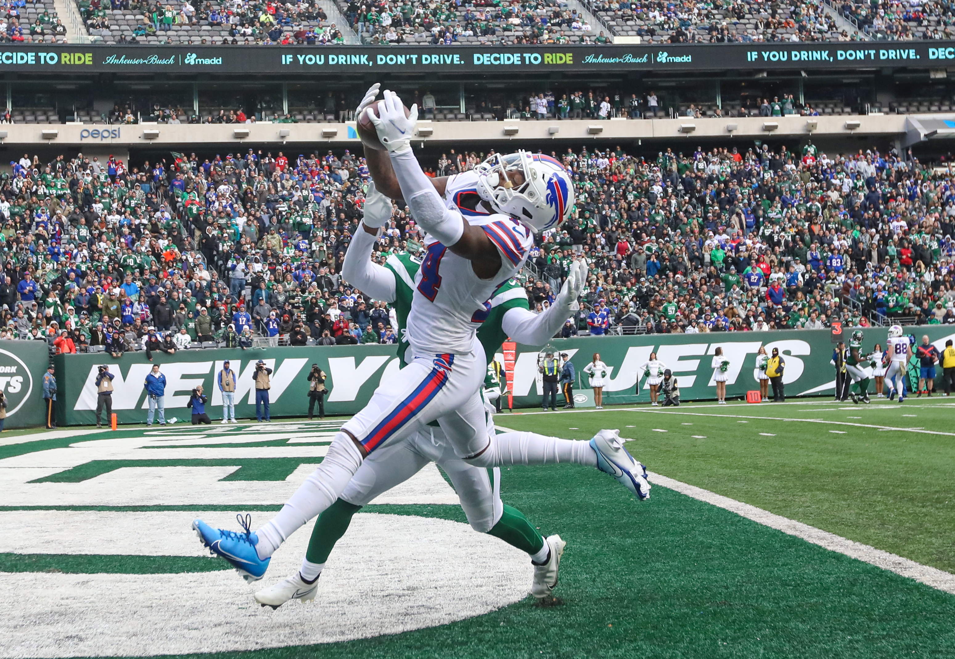 Buffalo Bills wide receiver Stefon Diggs (14) dances as he walks off the  field after an NFL foo …