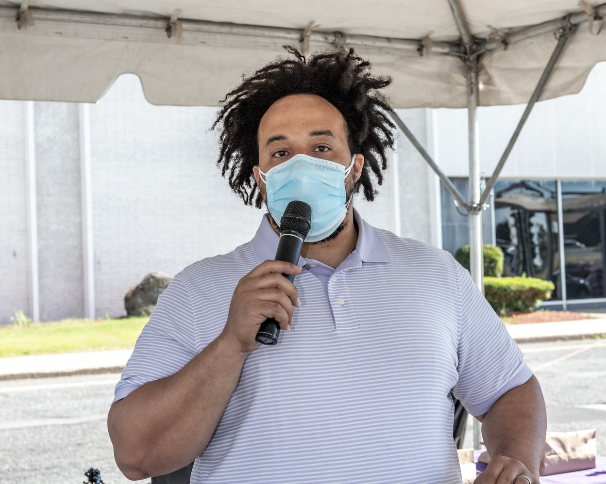 Reshawn Buckannon welcomes everyone to the Veritas Prep Charter School 8th grade 2020 DRIVE-In Graduation held in the parking lot of the Eastfield Mall. (Danny Nason Photo)