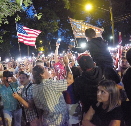 Staten Islanders protest migrant housing at the shuttered St. John ...