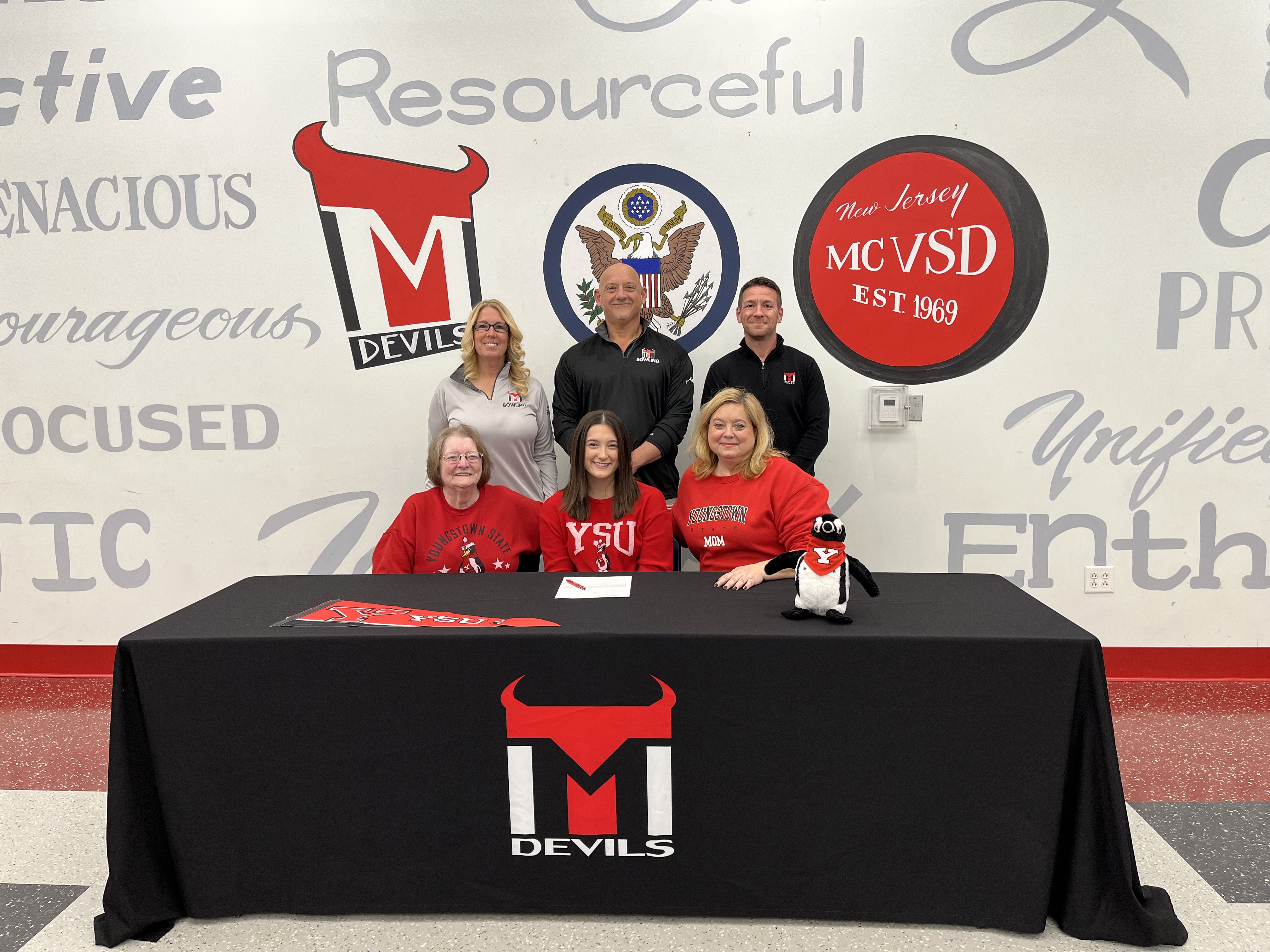 Amanda Granata will be attending Youngstown State University on a bowling scholarship.
Pictured in the front (L to R):
Cathy Granata (grandmother), Amanda Granata, Theresa Granata (mother)
Pictured in the back (L to R):
Colleen PAscale (asst coach), Lou Rosso (Head coach), Mark Menadier (AD)