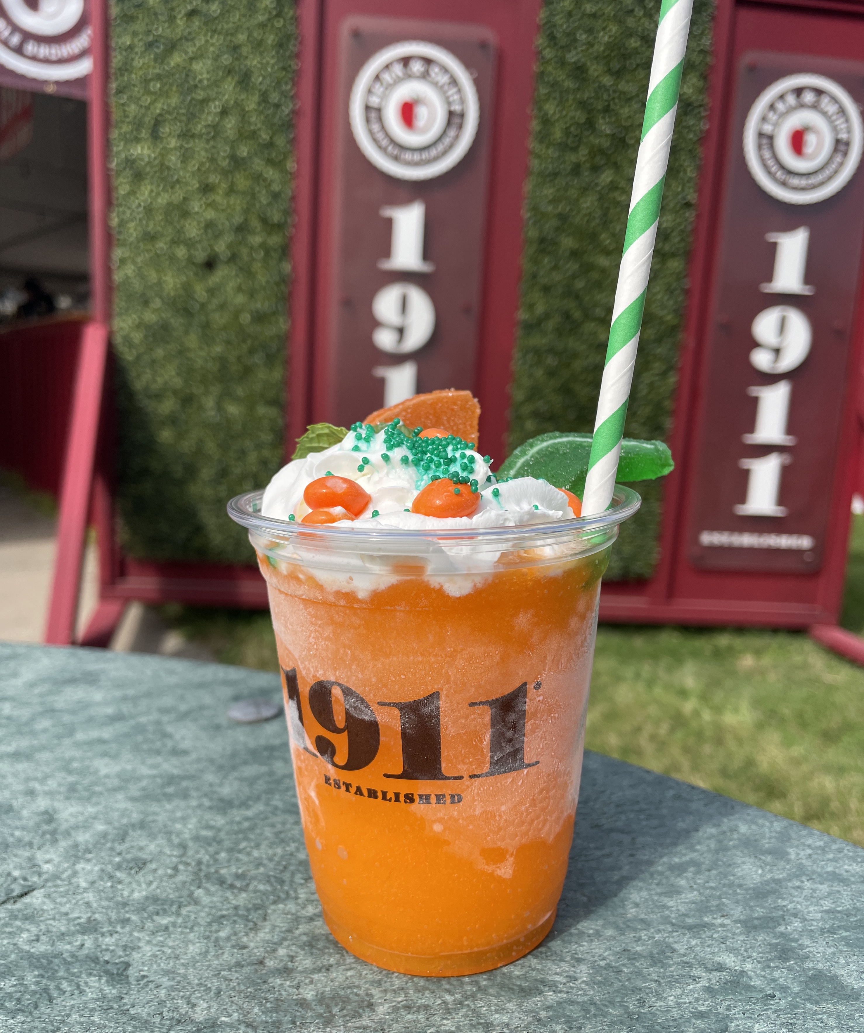 The Kind of a Big Peel cocktail features 1911 Orange Creamsicle Vodka, cream and soda, orange Skittles, Byrne Dairy whipped cream, two candy oranges and a spring of fresh mint. (Katrina Tulloch)