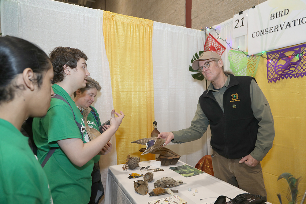 Dr David King from the Dept. of Energy spoke to students about Migratory Birds Conservation at the Sustainathon event taking place in the gym in building 2 at Springfield Technical Community College on April 11th. (Ed Cohen Photo)