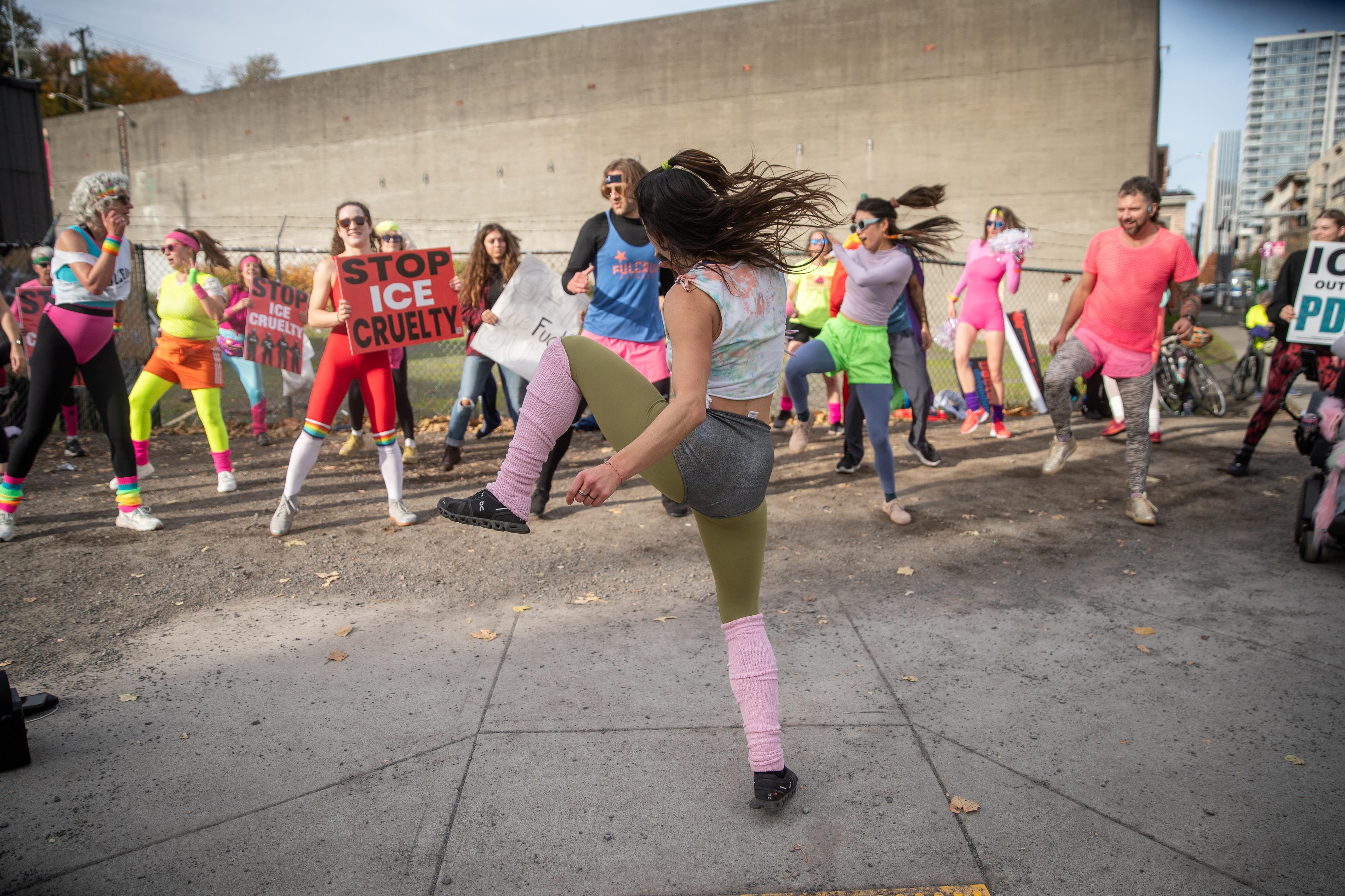 Participants in Fulcrum Fitness’s “Sweatin’ Out the Fascists” held an ’80s-aerobics peaceful protest outside the U.S. Immigration and Customs Enforcement (ICE) facility in South Portland on Sunday, Nov. 9, 2025, collecting donations for the Oregon Food Bank.
