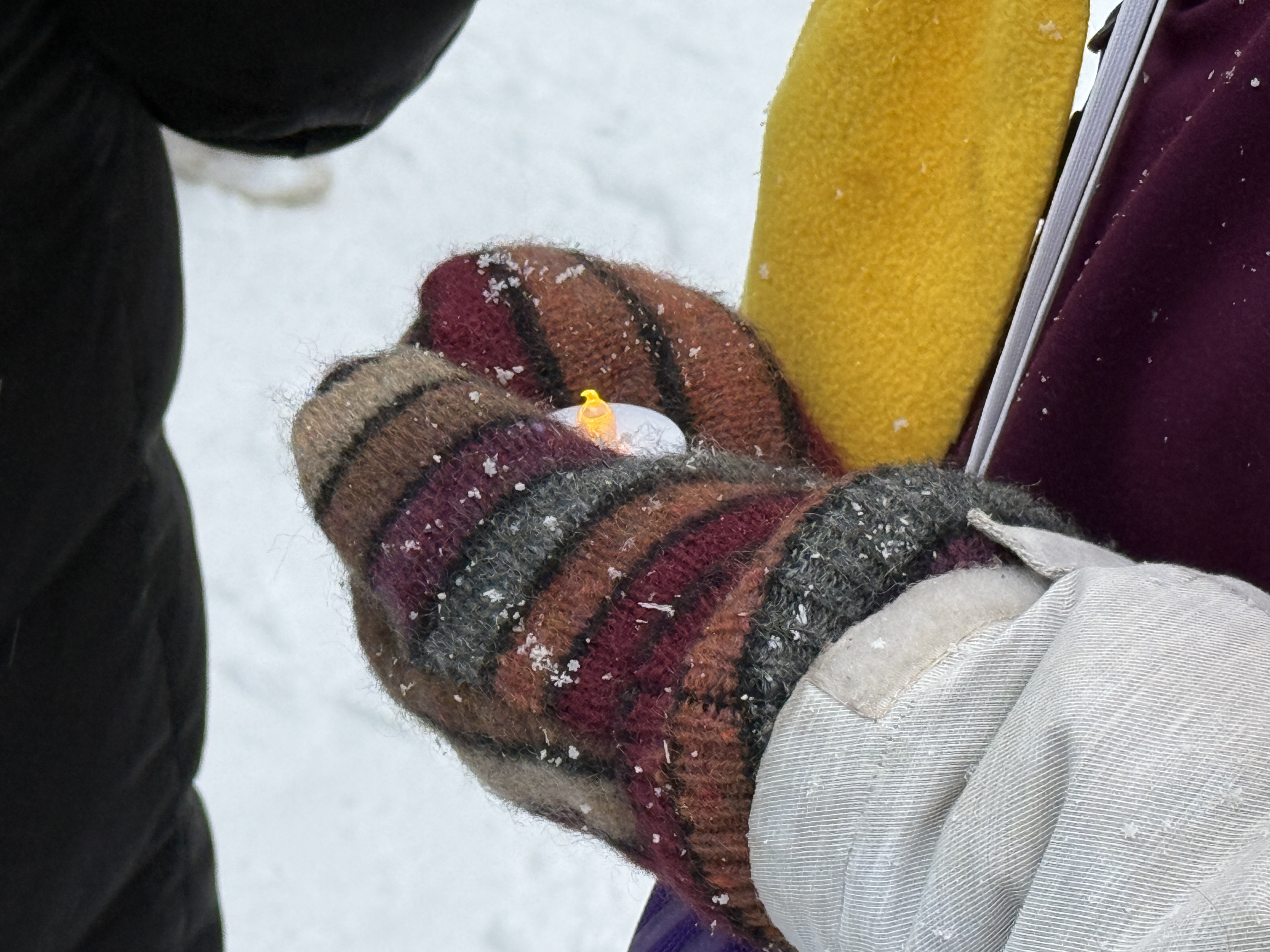 Muskegon community holds candlelight vigil for immigrants