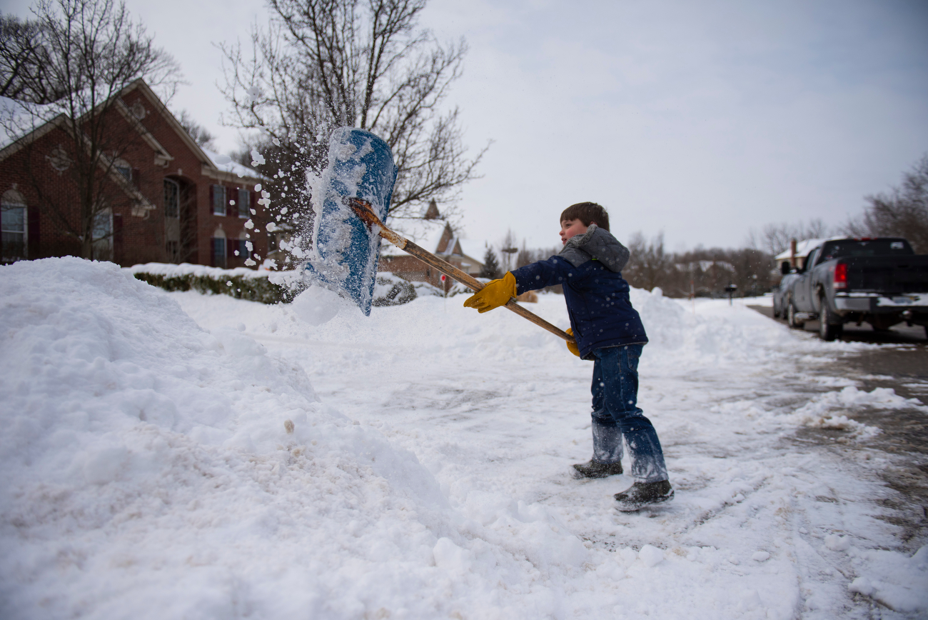 Kid starts a snow shoveling business to earn money and help people