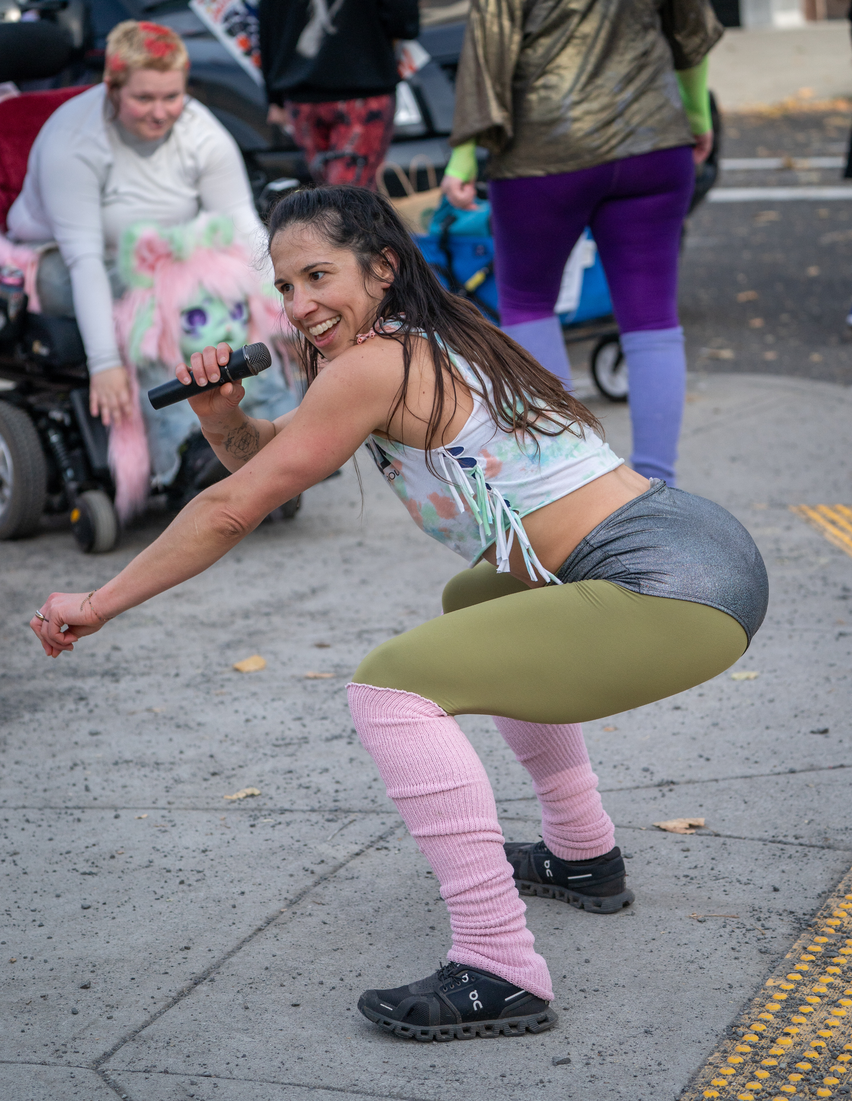 Participants in Fulcrum Fitness’s “Sweatin’ Out the Fascists” held an ’80s-aerobics peaceful protest outside the U.S. Immigration and Customs Enforcement (ICE) facility in South Portland on Sunday, Nov. 9, 2025, collecting donations for the Oregon Food Bank.