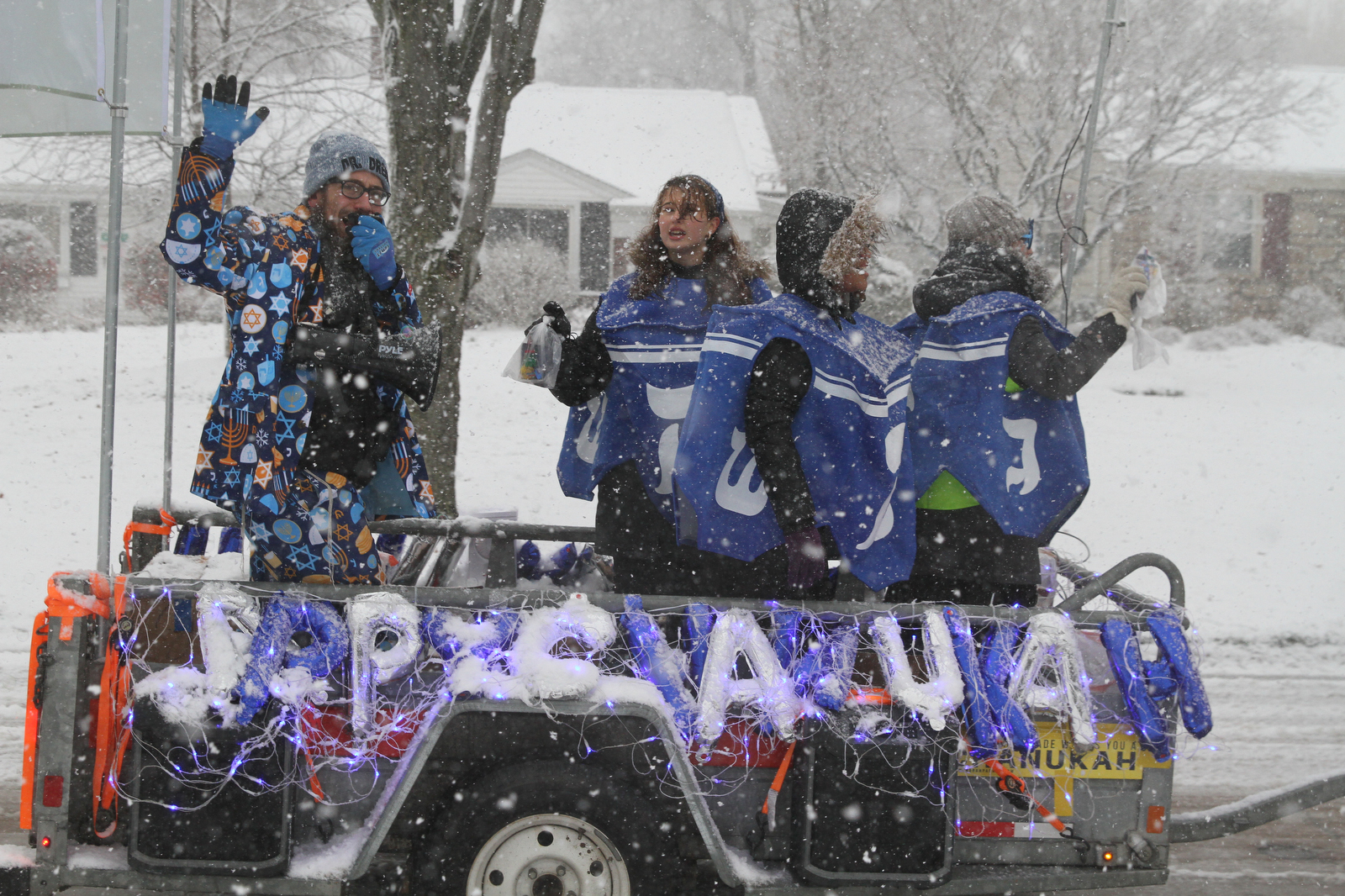 Menorahtopped cars parade through Cleveland eastern suburbs