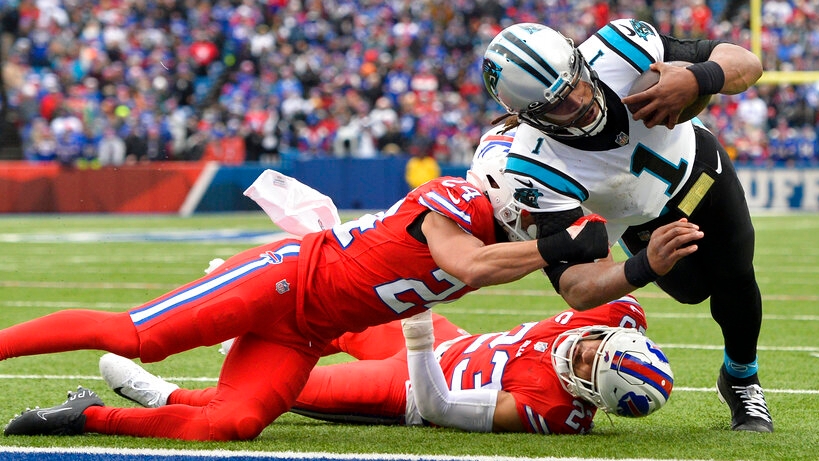 Carolina Panthers quarterback Cam Newton (1) carries against New Orleans  Saints cornerback P.J. Williams in the