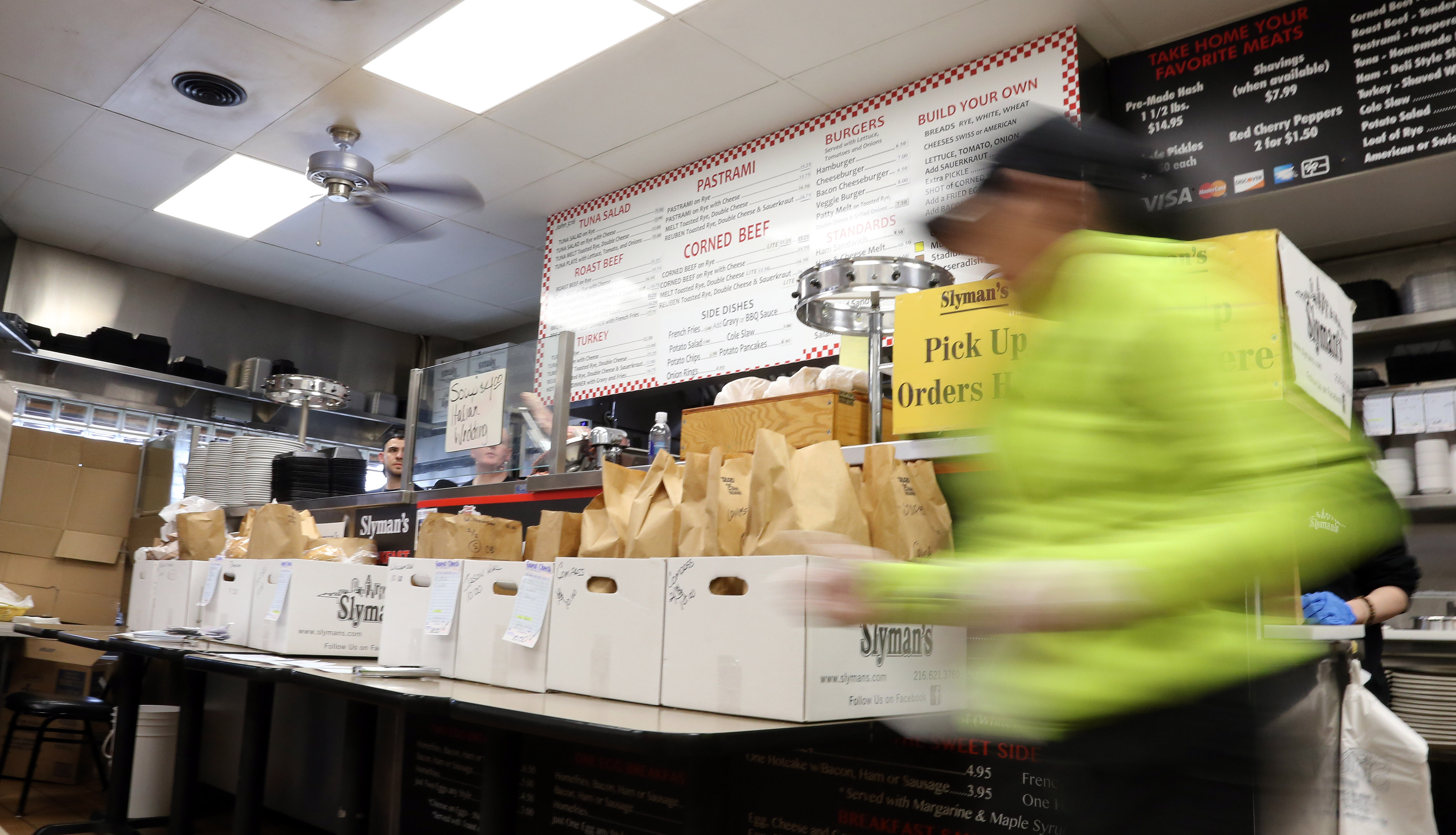 Fans of Slyman's corned beef wait in line despite Coronavirus concerns ...