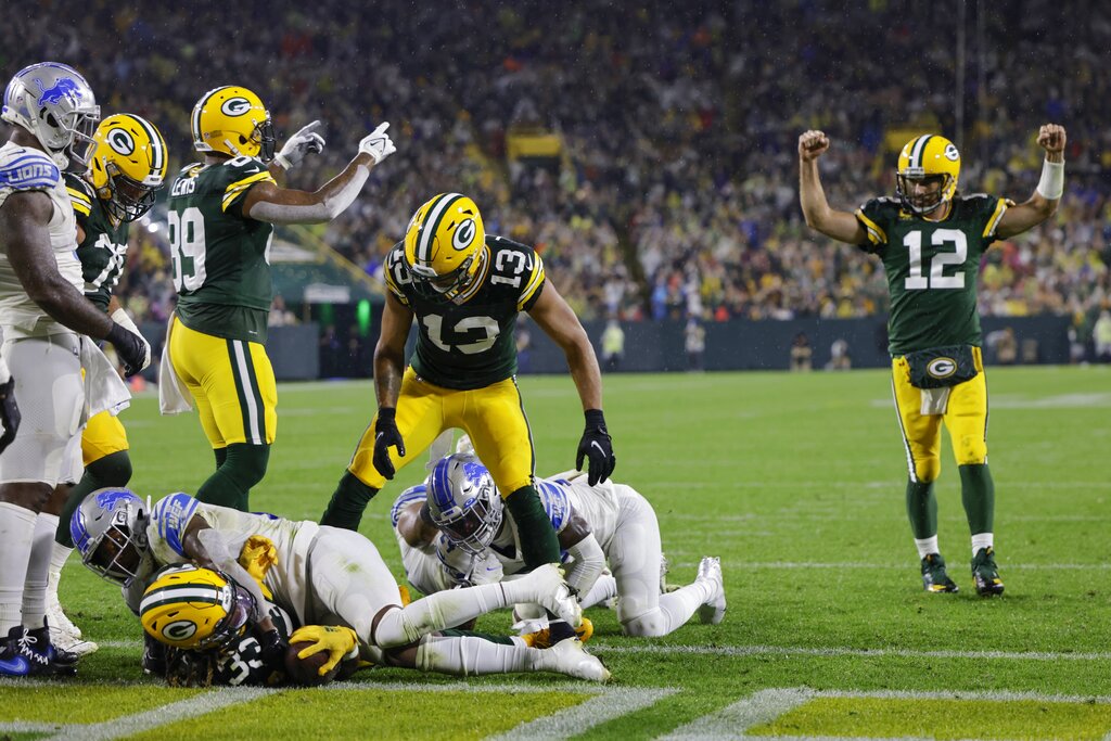 Aaron Jones scores four touchdowns as Packers beat Lions 35-17