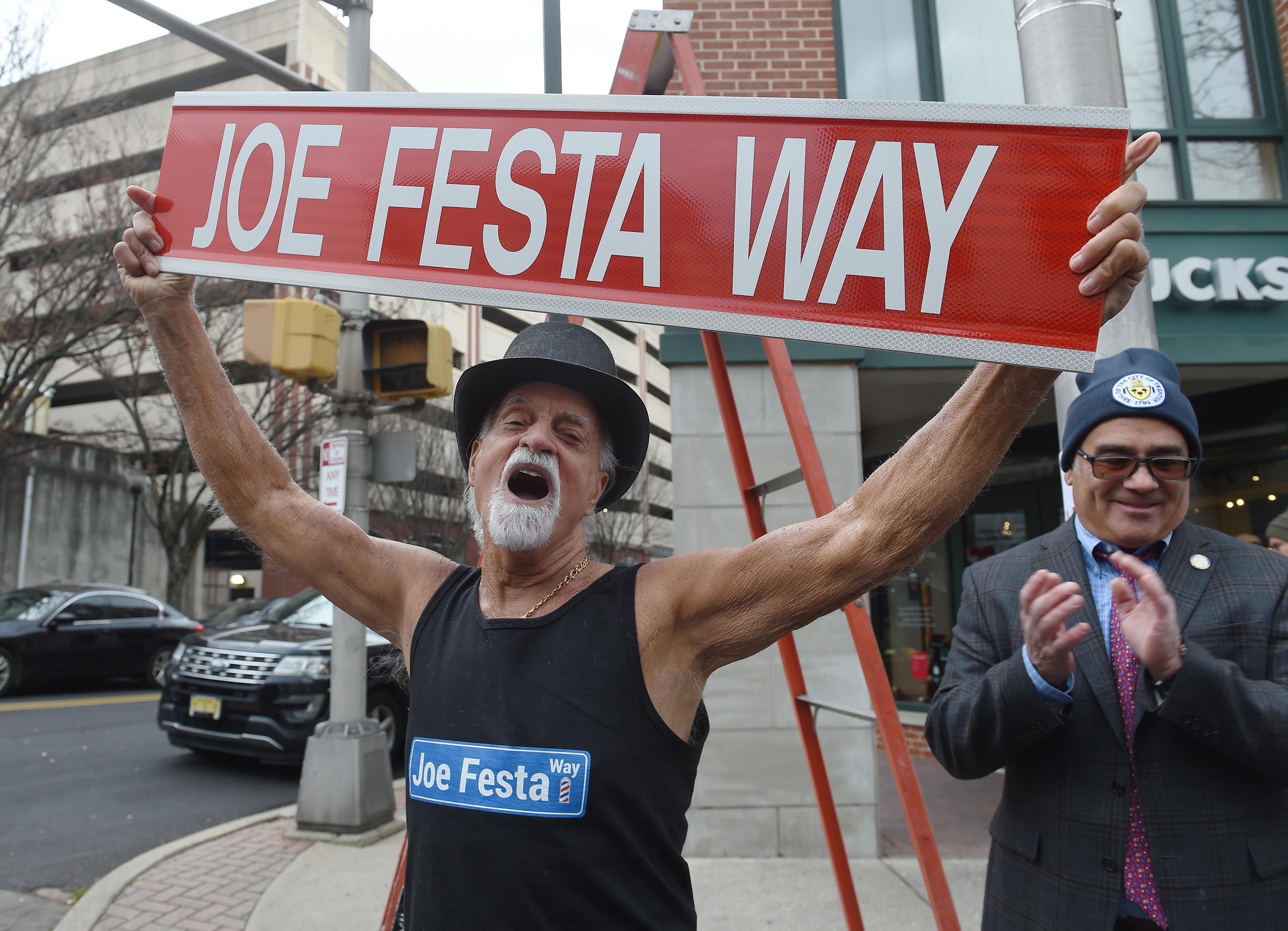 Trenton barber shop owner for 60 years gets street named in his honor