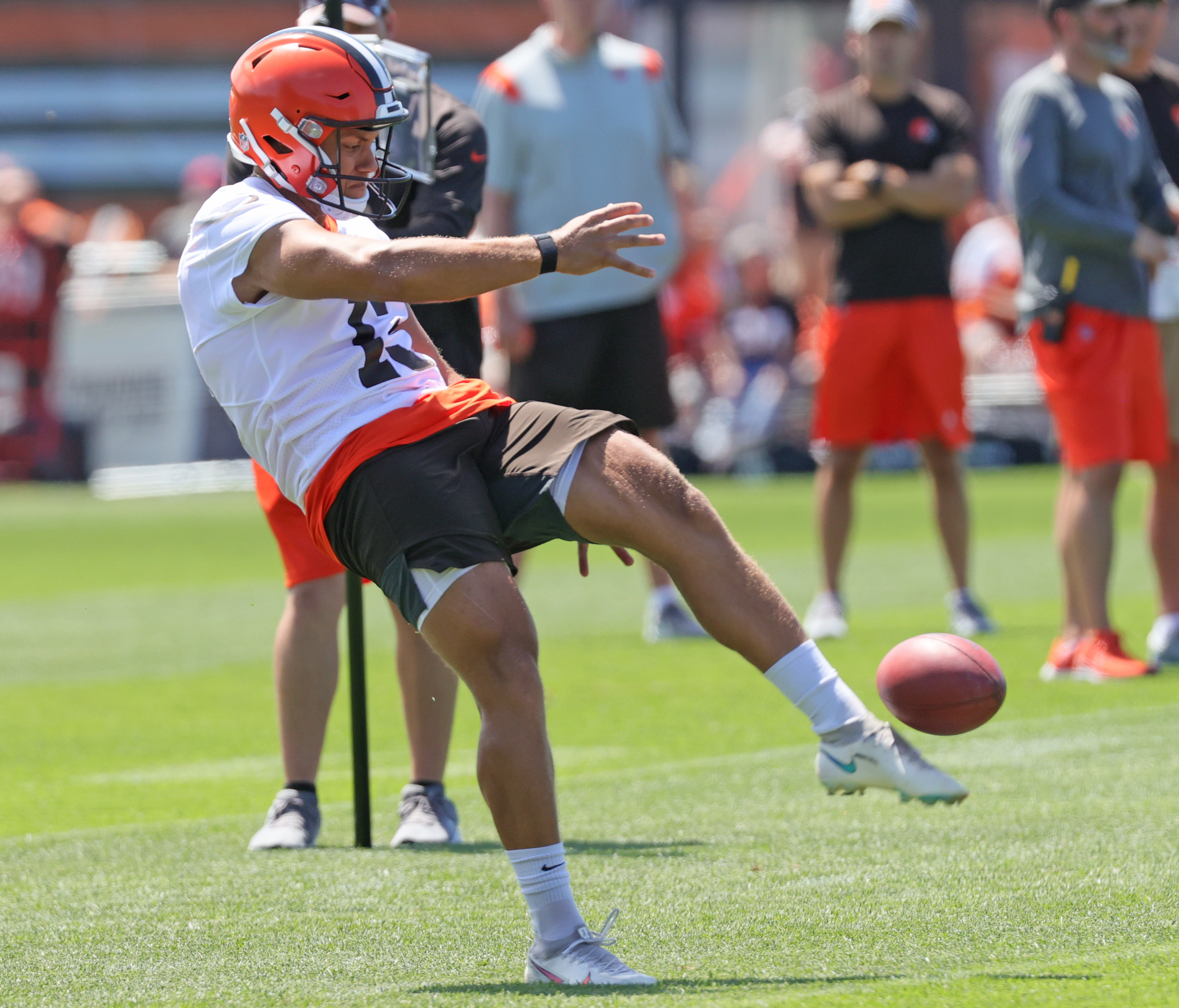 Cleveland Browns punter Corey Bojorquez (13) warms up before an