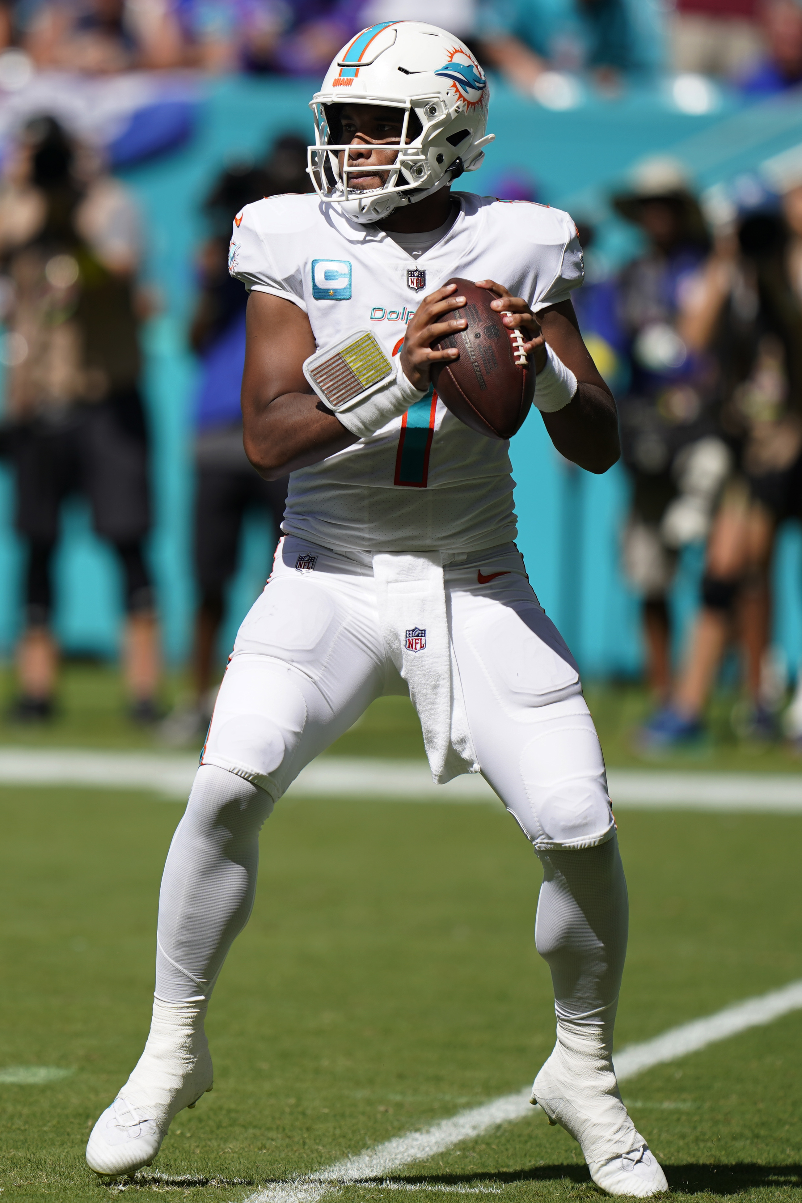 Miami Dolphins quarterback Tua Tagovailoa (1) watches a replay